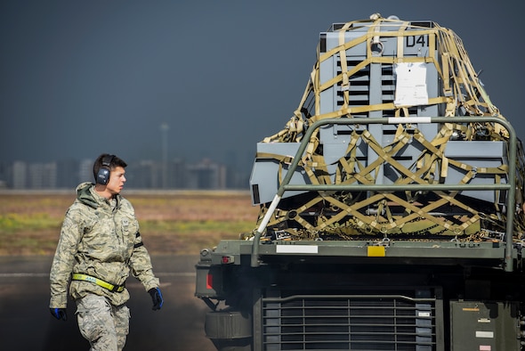 Senior Airman Dane Johnson, 728th Air Mobility Squadron aircraft services journeyman, unloads cargo from a K-loader March 3, 2019, at Incirlik Air Base, Turkey. The 728th AMS ensures the base has necessary supplies and is postured to support Operation Inherent Resolve. (U.S. Air Force photo by Staff Sgt. Ceaira Tinsley)