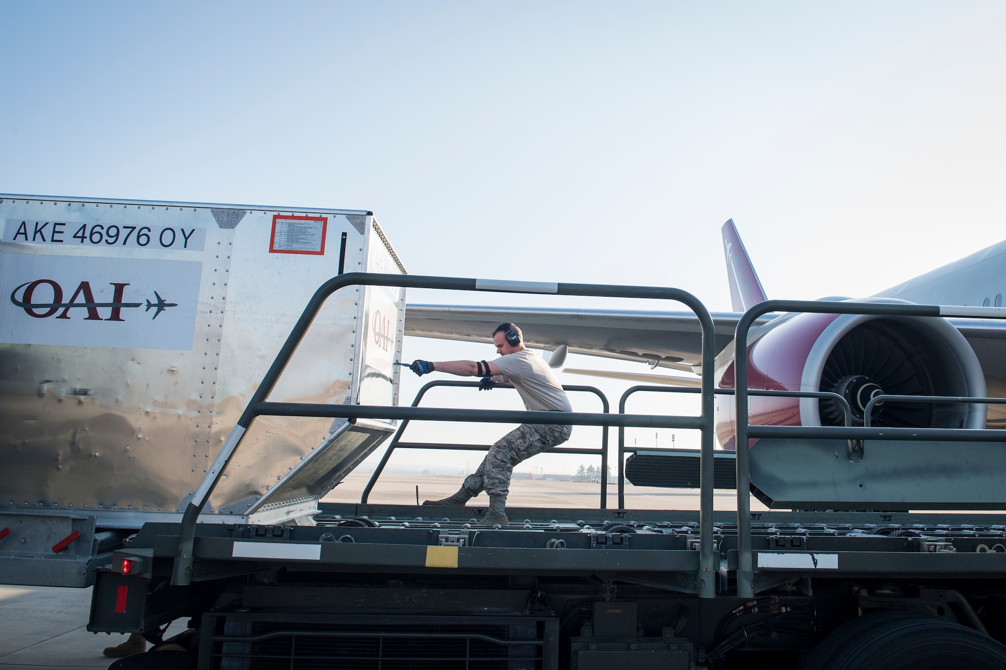 Airman Dylan Albright, 728th Air Mobility Squadron aircraft service journeyman pulls a luggage container March 19, 2019, at Incirlik Air Base, Turkey. The squadron falls under the 521st Air Mobility Operations Group, headquartered at Naval Station Rota, Spain, and the 521st Air Mobility Operations Wing, headquartered at Ramstein Air Base, Germany. (U.S. Air Force photo by Staff Sgt. Ceaira Tinsley)