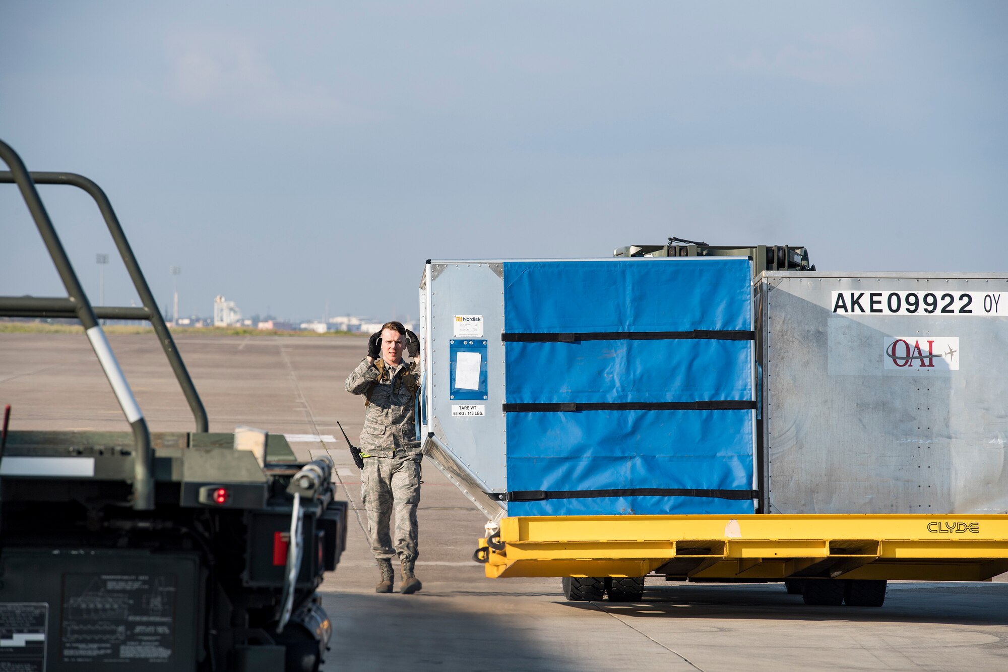 Senior Airman Waite Rowland, 728th Air Mobility Squadron aircraft service journeyman, marshals a forklift carrying luggage containers March 19, 2019, at Incirlik Air Base, Turkey. The 728th AMS consists of three flights: Aerial Port, Aircraft Maintenance and Combat Readiness and Resources. Together, they ensure safe and effective en route support for missions transiting Europe, Africa, and Southwest Asia and support five combatant commanders with aerial port operations, aircraft maintenance, and command and control 24/7/365. (U.S. Air Force photo by Staff Sgt. Ceaira Tinsley)