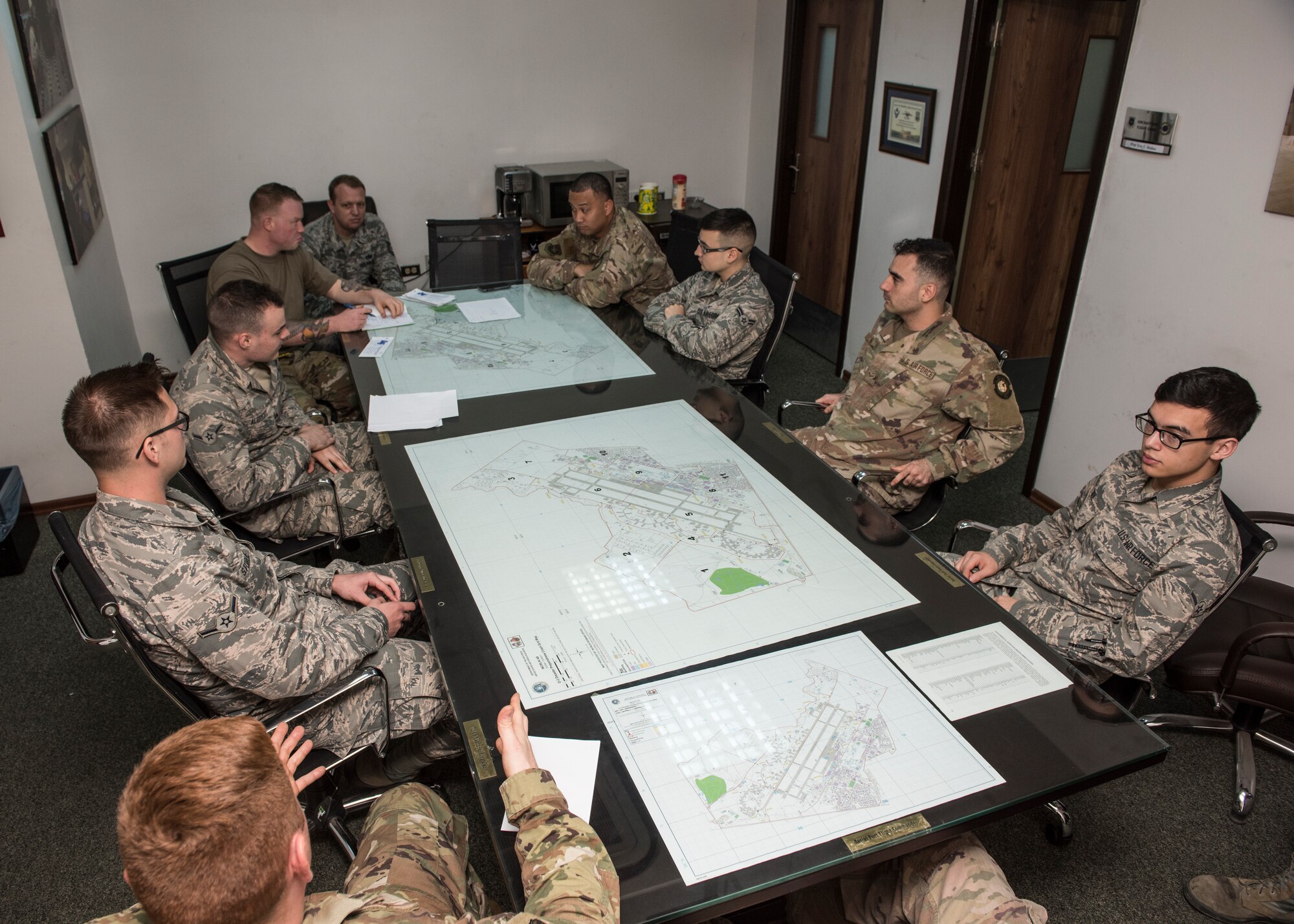 Airmen from the 728th Air Mobility Squadron conduct a meeting April 18, 2019, at Incirlik Air Base, Turkey. The unit provides expertise in three core competencies: aerial port operations, aircraft maintenance and command and control to support operations in Eastern Europe, Africa and Southwest Asia. (U.S. Air Force photo by Staff Sgt. Kirby Turbak)