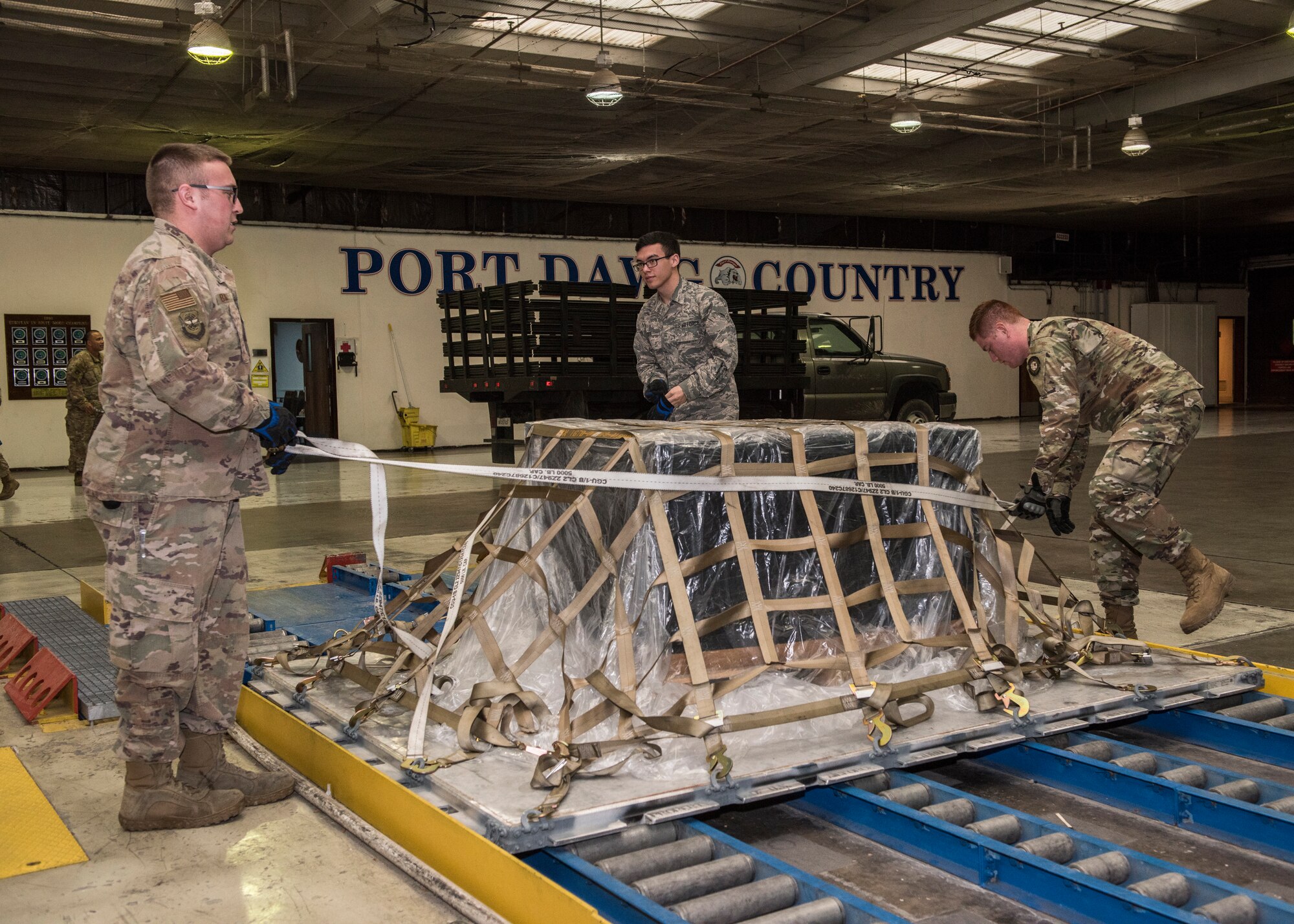 Airmen from the 728th Air Mobility Squadron secure a pallet April 16, 2019, at Incirlik Air Base, Turkey. The squadron falls under the 521st Air Mobility Operations Group, headquartered at Naval Station Rota, Spain and the 521st Air Mobility Operations Wing, headquartered at Ramstein Air Base, Germany. (U.S. Air Force photo by Staff Sgt. Kirby Turbak)