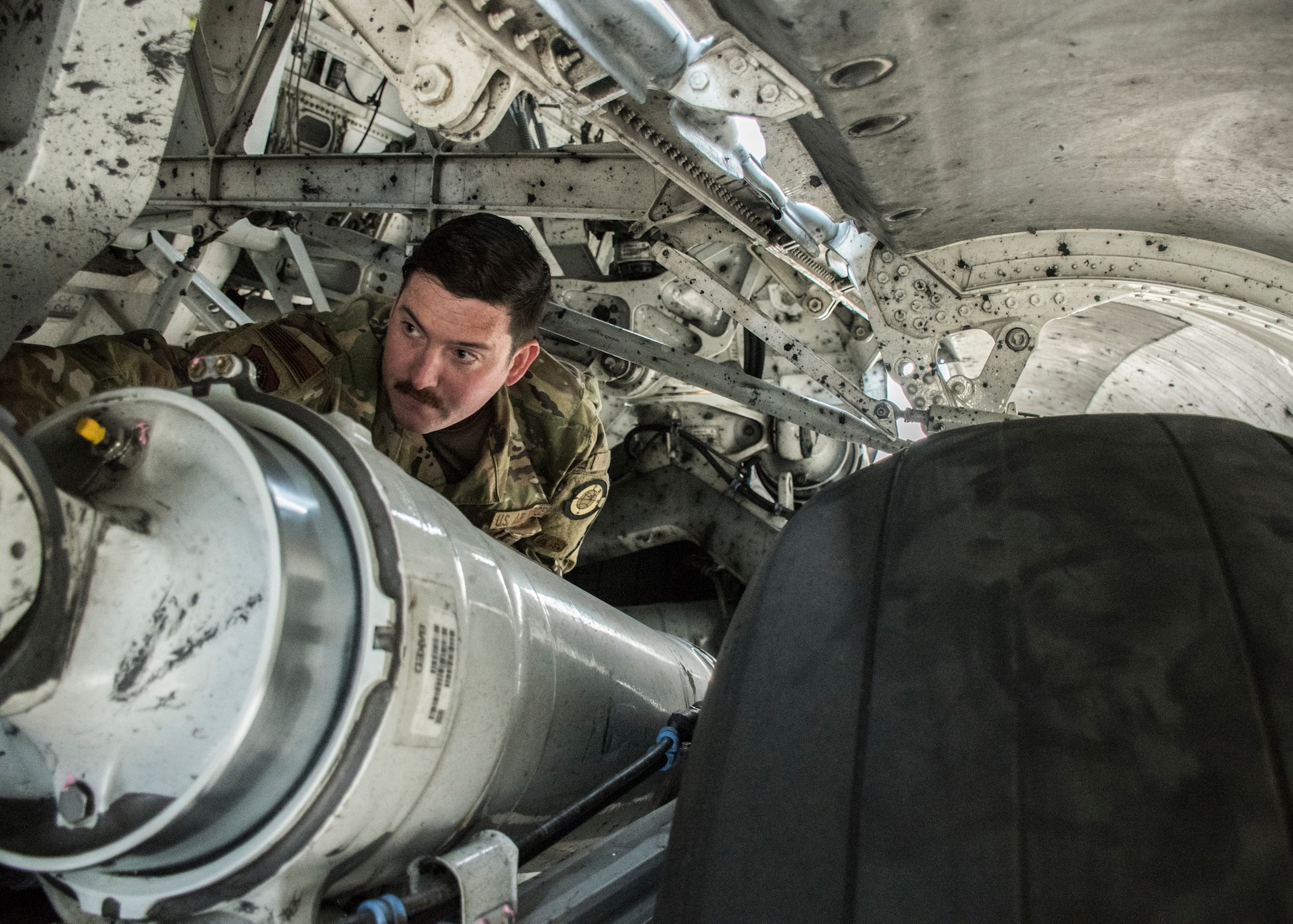 Staff Sgt. Alexander Trexler, 728th Air Mobility Squadron crew chief, conducts a preflight inspection April 18, 2019, at Incirlik Air Base, Turkey. Crew chiefs perform maintenance as well as help guide and direct aircraft on the flightline. (U.S. Air Force photo by Staff Sgt. Kirby Turbak)