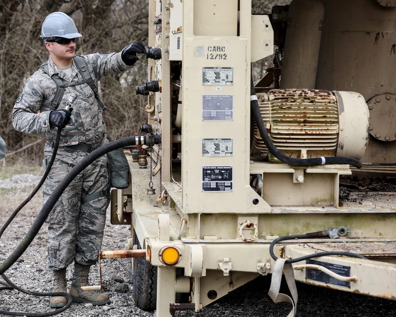 Staff Sgt. Jarrad Faulkner, 445th Civil Engineering Squadron, salvages parts of a reverse osmosis water purification unit during the annual Agile Combat Support exercise at the Warfighter Training Center April 7, 2019.
