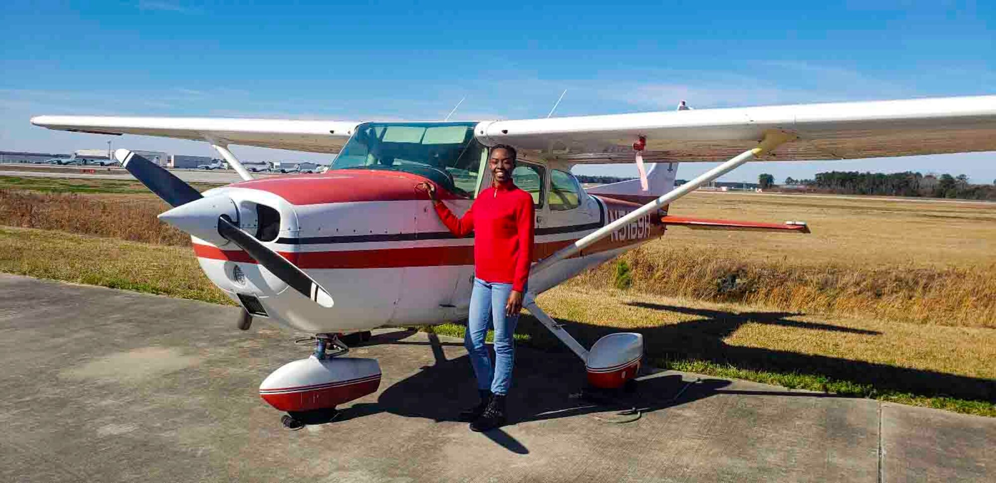 Staff Sgt. Shakeyna Smith, aviation resource management technician with the 701st Airlift Squadron at Joint Base Charleston, stands next to a Cessna 172 before taking flight, Jan. 25, 2019, in North Charleston, South Carolina. Smith completed 72 hours of flight time through Charleston Regional Accelerated Flight Training and IFR6 of N. Charleston, S.C., before persuing a commision in the U.S. Air Force to pilot C-17 Globemaster III's while being a single parent of two, a full-time college student and an Air Force Reservist. (Courtesy photo/Staff Sgt. Shakeyna Smith)