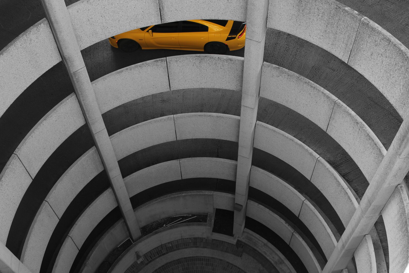 “Downward Spiral” is one of 31 photos taken by students from the Cole High School photography program that are included in the exhibit, “San Antonio: Esta es mi Ciudad,” at the Institute of Texan Cultures. Raquelle Bennett took the photo of a downtown San Antonio parking garage. To add contrast to the photo and make it appealing to the eye, Bennett made the background of it, including the parking garage, black and white, while leaving the color of the vehicle pictured in it yellow.