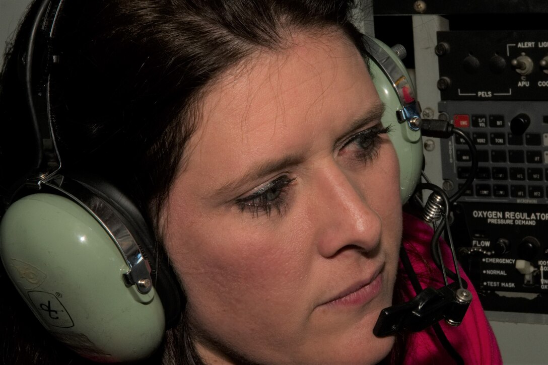 Mindy Nagy listens in on the conversation of a KC-135 Stratotanker crew on the way to Wright-Patterson Air Force Base, Ohio, May 1, 2019.  Nagy was one of dozens of civic leaders from Dyess AFB taking part in a tour to learn more about the Air Force mission.  The civic leader tour was organized by the 307th Bomb Wing at Barksdale AFB and hosted by the 445th Airlift Wing at Wright-Patterson AFB. (U.S. Air Force photo by Master Sgt. Ted Daigle