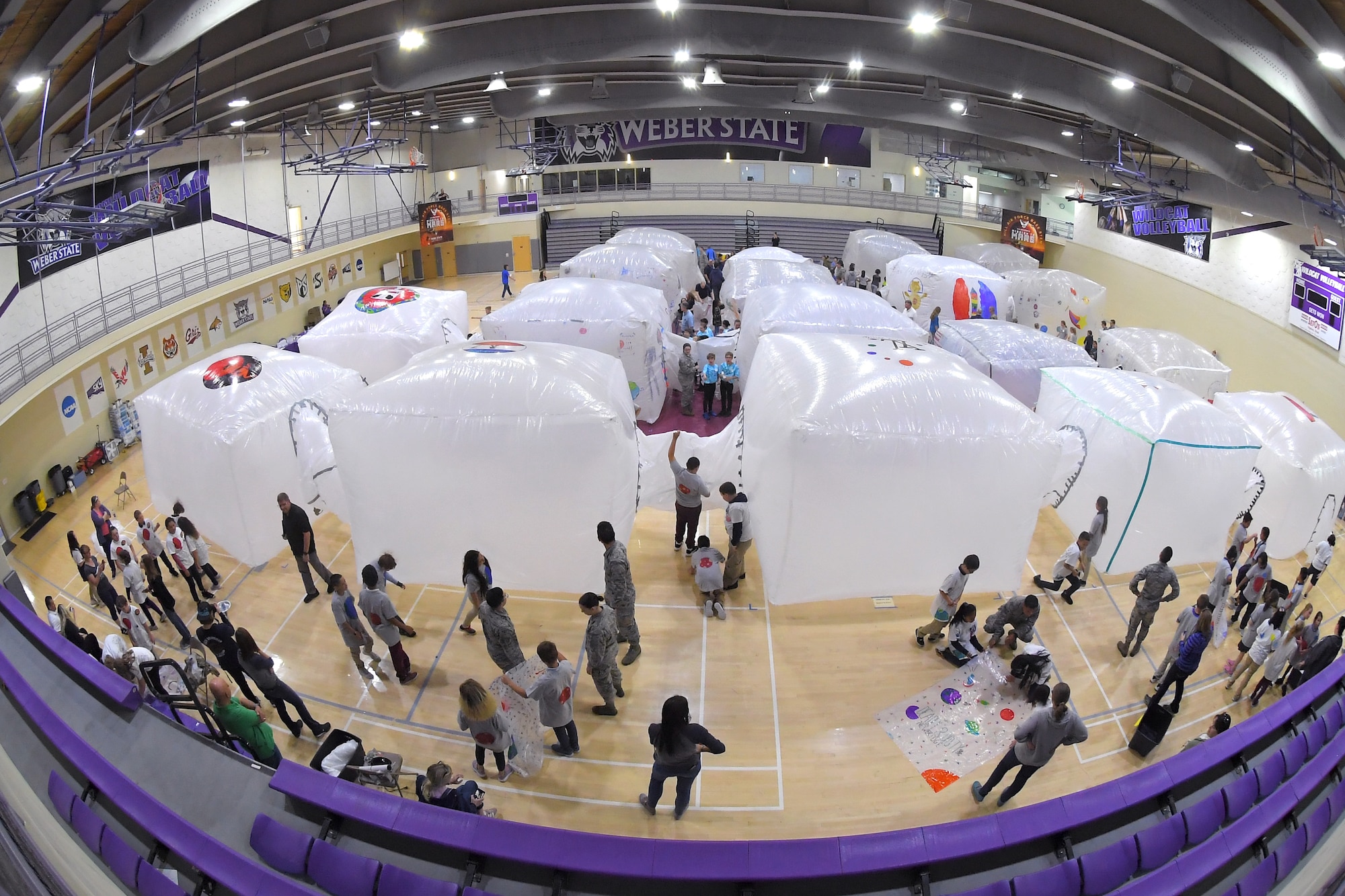 Fifth grade students inflate simulated space habitats during ‘Mission to Mars’ at Weber State University May 2, 2019. Mission to Mars is facilitated by Hill Air Force Base as part of the STEM Outreach Program, which partners with local school teachers by providing a curriculum, materials and events to teach STEM-related subjects in a creative and fun environment. (U.S. Air Force photo by Todd Cromar)