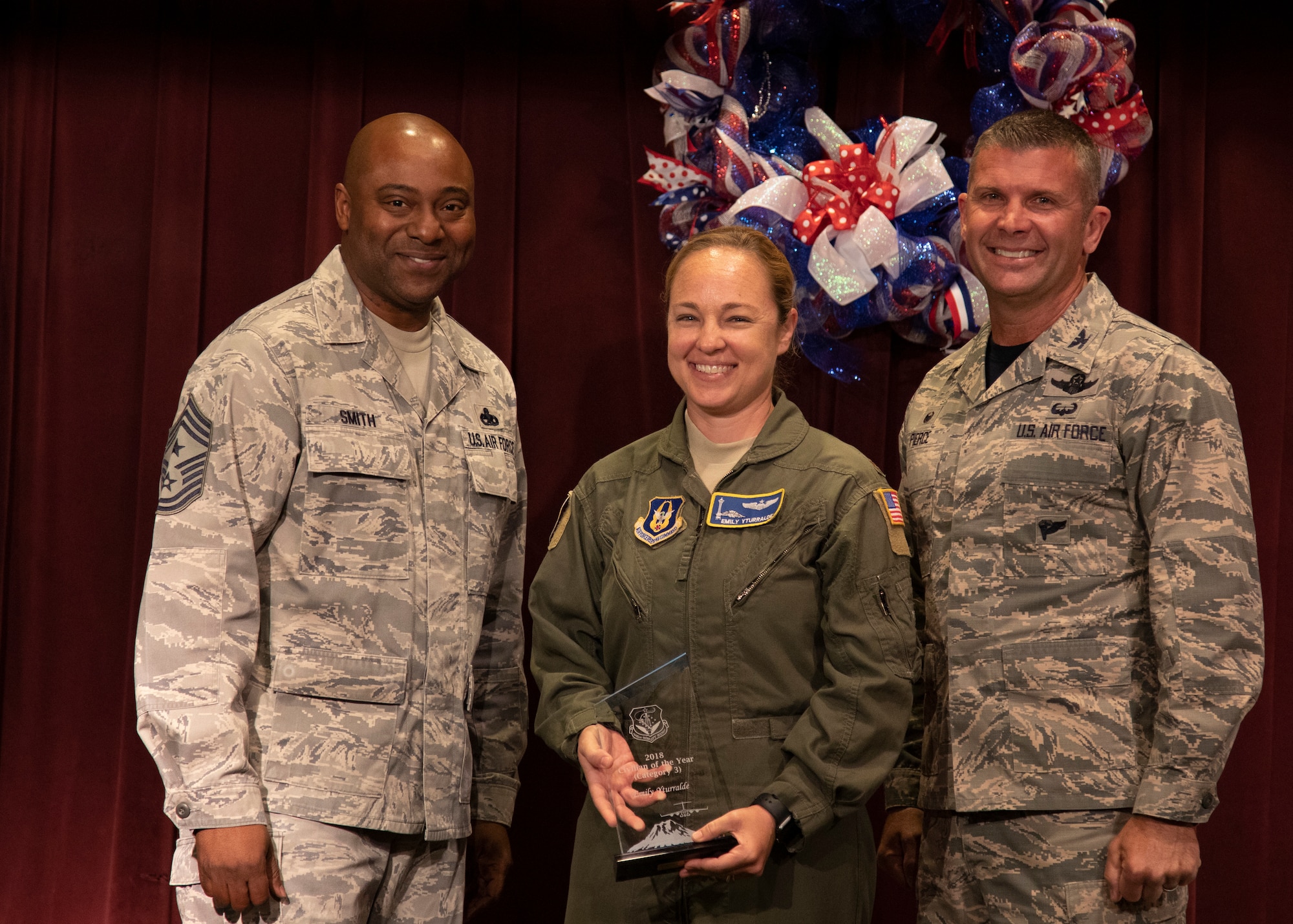 Major Emily Yturralde, 446th Airlift Wing, wins the award for Civilian of the Year (category 3).