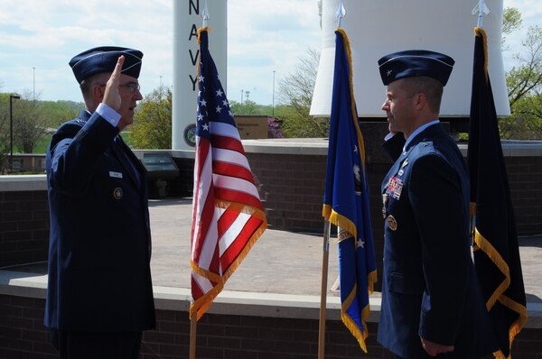 Gen. John Hyten, commander of U.S. Strategic Command (USSTRATCOM), delivers the reaffirmation of the oath of enlistment to Brig. Gen. Ty Neuman, director of the Commander’s Action Group for USSTRATCOM, during Neuman’s promotion ceremony to the rank of brigadier general at Offutt Air Force Base, May 3, 2019.