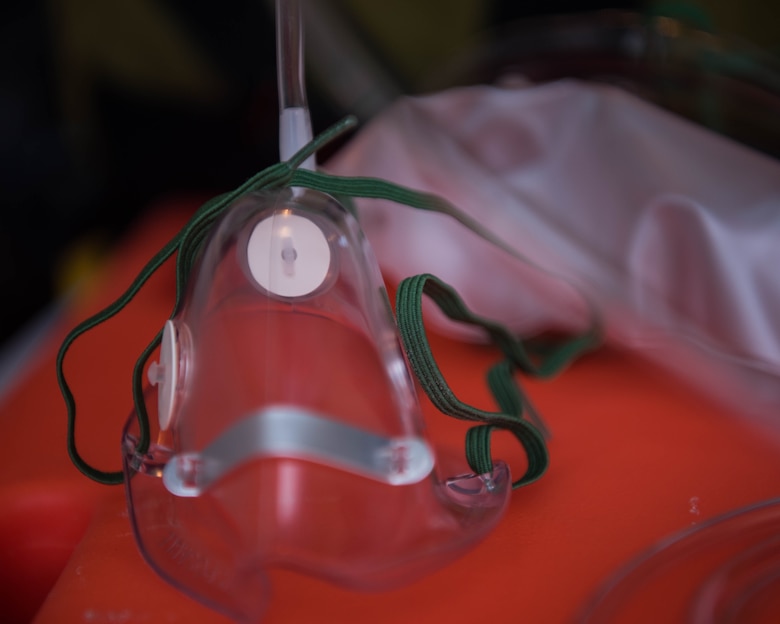 A masked used to administer oxygen to simulated victims during an exercise on Joint Base Langley-Eustis, Virginia, April 25, 2019. (U.S. Air Force photo by Airman 1st Class Marcus M. Bullock)