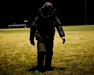 A member of Explosive Ordinance Disposal walks back after inspecting a suspicious device during an exercise on Joint Base Langley- Eustis, Virginia, April 25, 2019. Members of Explosive Ordinance Disposal had a simulated detonation of the explosive ordinance later in the exercise. (U.S. Air Force photo by Airman 1st Class Marcus M. Bullock)