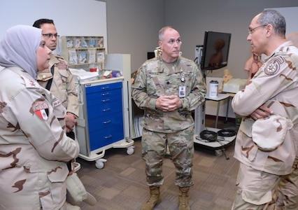 Brig. Gen. Mohamed Sherif and Brig. Gen. Hala Ahmed of the Egyptian Ministry of Defense, along with members of their staffs, are briefed by Lt. Col. Steven Kertes, Deputy Director of the U.S. Army Graduate Program in Anesthesia Nursing, during a visit to the Army Medical Department Center and School, Army Health Readiness Center of Excellence April 26. The Egyptian generals paid a visit to learn about the different programs and see first-hand training and detailed briefings by instructors and subject matter experts.