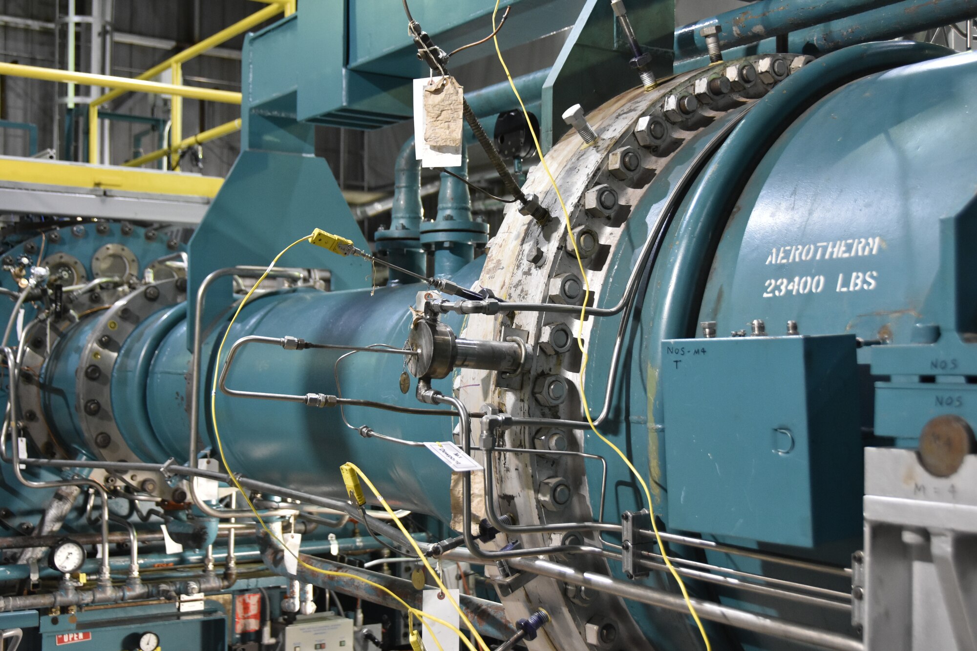 The Mach 4 Aerotherm Nozzle assembly is back up and running in von Kármán Gas Dynamics Facility Wind Tunnel C at Arnold Air Force Base after repairs due to a leak found in the Mach 4 Throat portion of the assembly. The VKF Test crew and engineer Brad Peckinpaugh, who began his career at Arnold less than a year ago, were recently recognized for their efforts to repair the leak. (U.S. Air Force photo by Bradley Hicks)