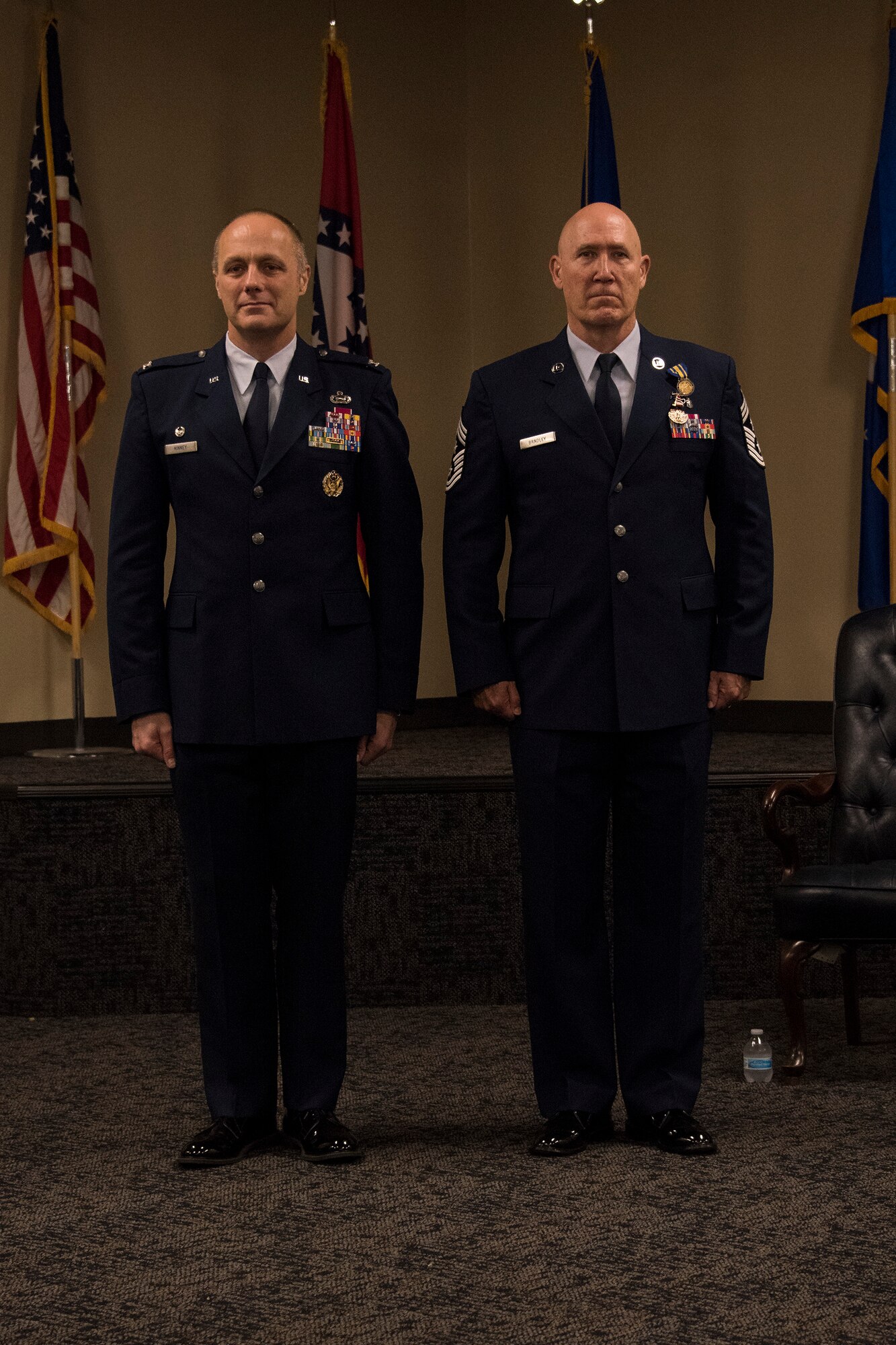 188th Wing Commander, Col. Robert I. Kinney, publishes a retirement order for Chief Master Sgt. Stephen R. Bradley, 188th Wing command chief master sergeant, during a retirement ceremony held May 4, 2019, at Ebbing Air National Guard Base, Arkansas. Bradley served 37 years as a dental technician, first sergeant, and eventually 188th Wing command chief. (U.S. Air National Guard photo by Tech. Sgt. John E. Hillier)