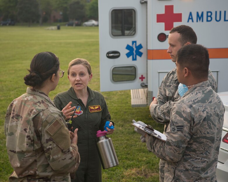 A group of Airmen gather to discuss the triage techniques they used during an exercise on Joint Base Langley- Eustis, Virginia, April 25, 2019. This group had to handle roughly 20 simulated victims during the exercise.(U.S. Air Force photo by Airman 1st Class Marcus M. Bullock)