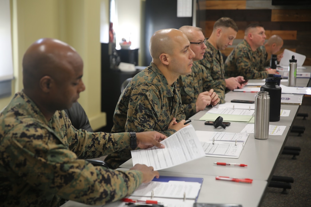 The Chief Instructor, BRC Course Head, and section Course Chiefs provide balanced feedback during the new instructor teach-back interviews.