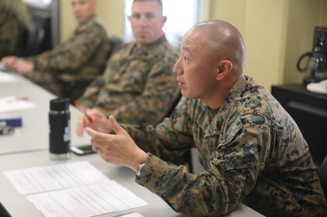 Gunnery Sergeant Ryan Lungerhausen provides balanced feedback during the new instructor teach-back interview. The feedback given allows course instructors to constantly improve the product they deliver to each student.