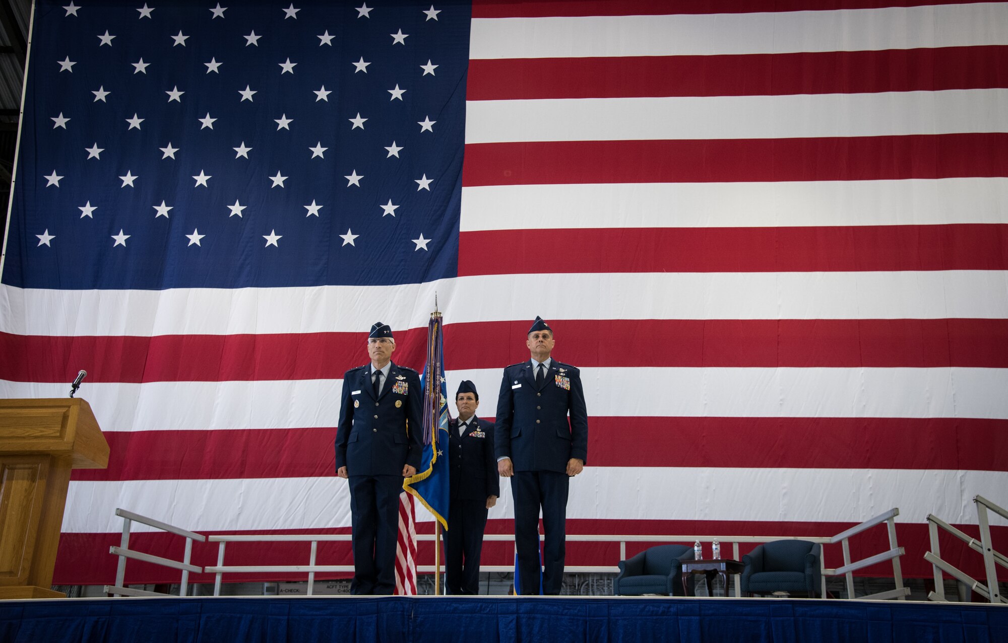 Maj. Gen. Craig La Fave, 22nd Air Force commander, Chief Master Sgt. Barbara Gilmore, 932nd Airlift Wing command chief, and Col. Glenn Collins, 932nd AW commander stand at attention as the order is being published authorizing the transfer of responsibilities during the assumption of command May 5, 2019, at Scott Air Force Base, Illinois. Collins said he will work tirelessly every moment of everyday to the best of his abilities to ensure all the 932nd Citizen Airmen have the resources and training necessary to go throughout the world to perform the missions that the nation has called upon them to do. (U.S. Air Force photo by Senior Airman Melissa Estevez)