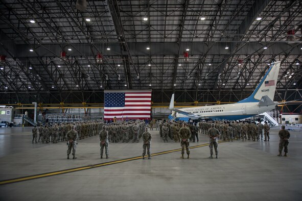 Citizen Airmen of the 932nd Airlift Wing, also known as the Gateway Wing, stand at ease during the assumption of command May 5, 2019, at Scott Air Force Base, Illinois. The 932nd AW is comprised of over 1,100 Citizen Airmen who support the national interests providing distinguished visitor airlift, ground and aeromedical patient care and expeditionary combat support. (U.S. Air Force photo by Senior Airman Brooke Deiters)