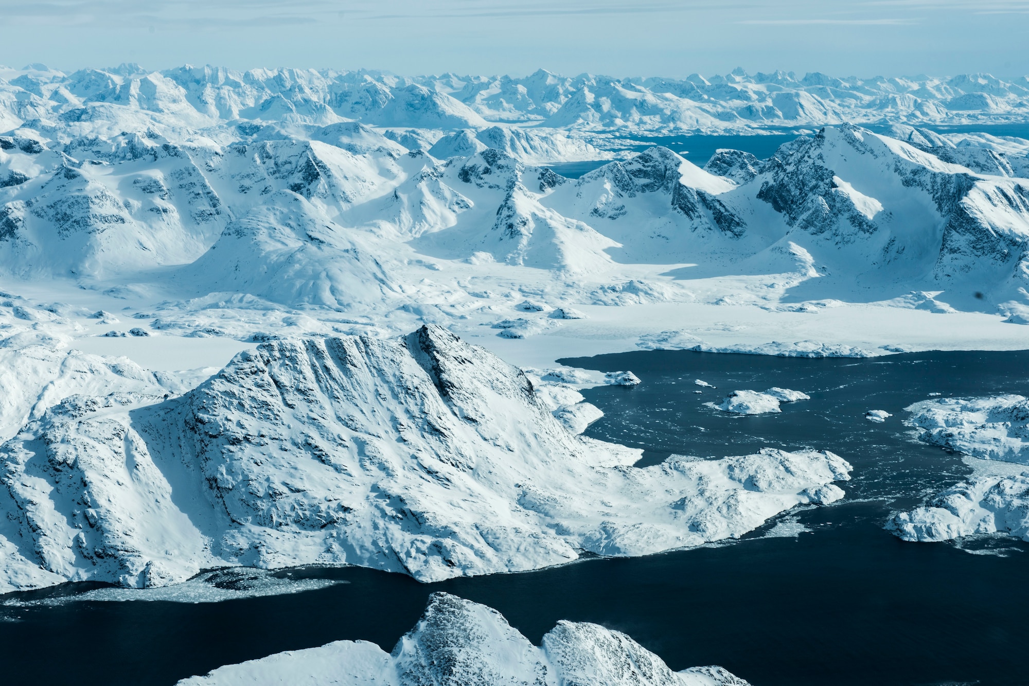 A view of the mountains from the cockpit of a C-130 H aircraft, April 2, 2019 in Kangerlussuaq, Greenland. The 118th flew to Greenland in support of the National Science Foundation climate research mission. (U.S. Air National Guard photo by Tech. Sgt. Tamara R. Dabney)