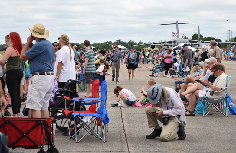Crowds gather to watch aerial performances on the flightline during the Keesler and Biloxi Air and Space Show at Keesler Air Force Base, Mississippi, May 5, 2019. The two-day event included various static displays on the base flightline and the U.S. Air Force Thunderbirds, U.S. Army Black Daggers and other aerial performances over the beach. Thunder Over the Sound is a unique, one-of-a-kind event where a base and its surrounding city jointly host one air show geographically separated. (U.S. Air Force photo by Kemberly Groue)