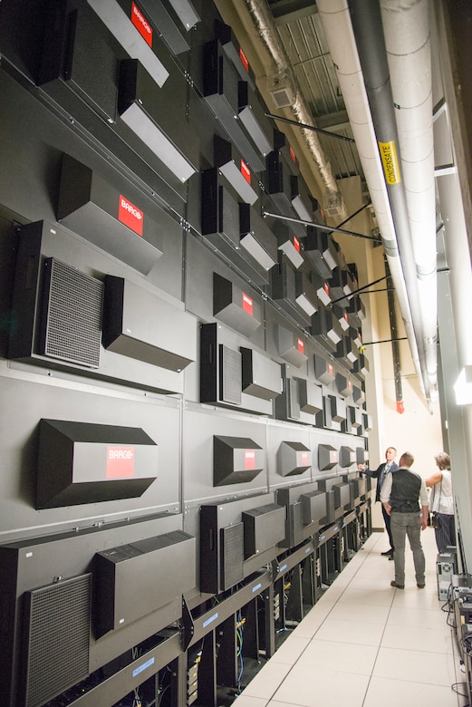 During a visit April 1, 2019, three members of the Huntsville, Alabama-based U.S. Army Engineering and Support Center check on the progress of a project to modernize the facility communication distribution systems in the Conference Center of the Americas at the U.S. Southern Command headquarters in Doral, Florida. From left are Tracy Phillips, chief of the Facility Technology Integration Branch; Chris Harvel, project manager with the Communications Infrastructure and Systems Support program; and Stacy Freeman, CIS2 program manager.