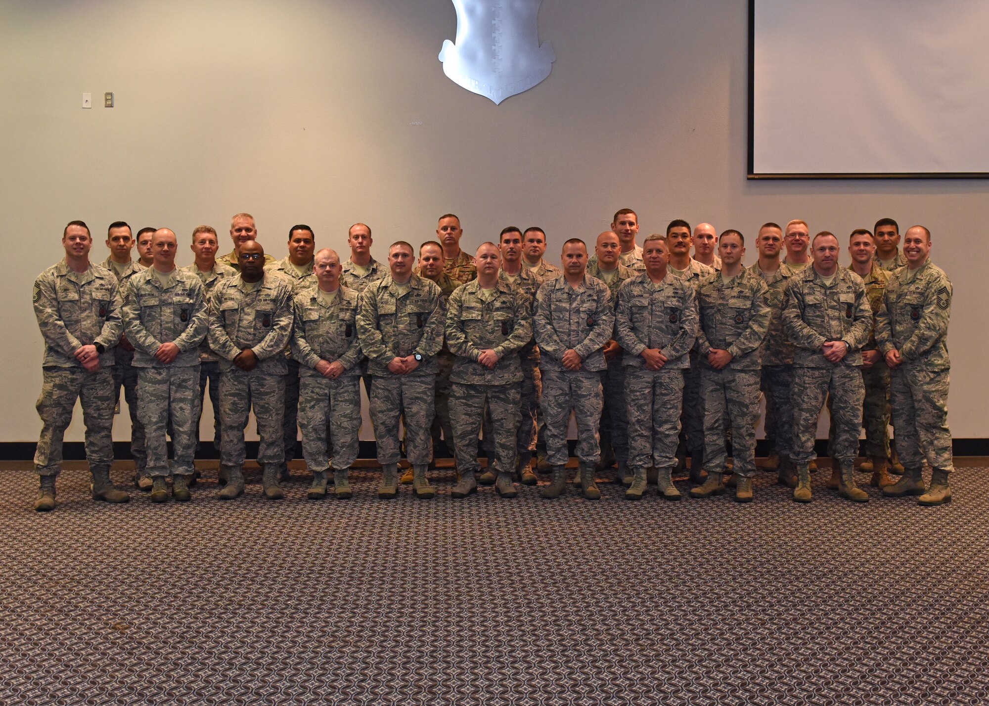 Members from the Air Force Reserve Command Fire Chief’s Conference pose for a group photo during their meeting at Goodfellow Air Force Base, May 2 to May 4, 2019. The chiefs toured Goodfellow getting a glimpse at the training that their troops go through, discussed finances across the AFRC, and their mission in general. (U.S. Air Force photo by Airman 1st Class Zachary Chapman/Released)