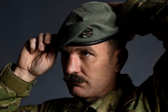 U.S. Air Force Tech. Sgt. Garry McLean, 336th Training Group Survival, Evasion, Resistance and Escape specialist, dawns his beret for a photo at Fairchild Air Force Base, Washington, April 19, 2019. McLean overcame his battle with depression after experiencing life changing events that led to the dismantling of his family. (U.S. Air Force photo by Airman 1st Class Lawrence Sena)
