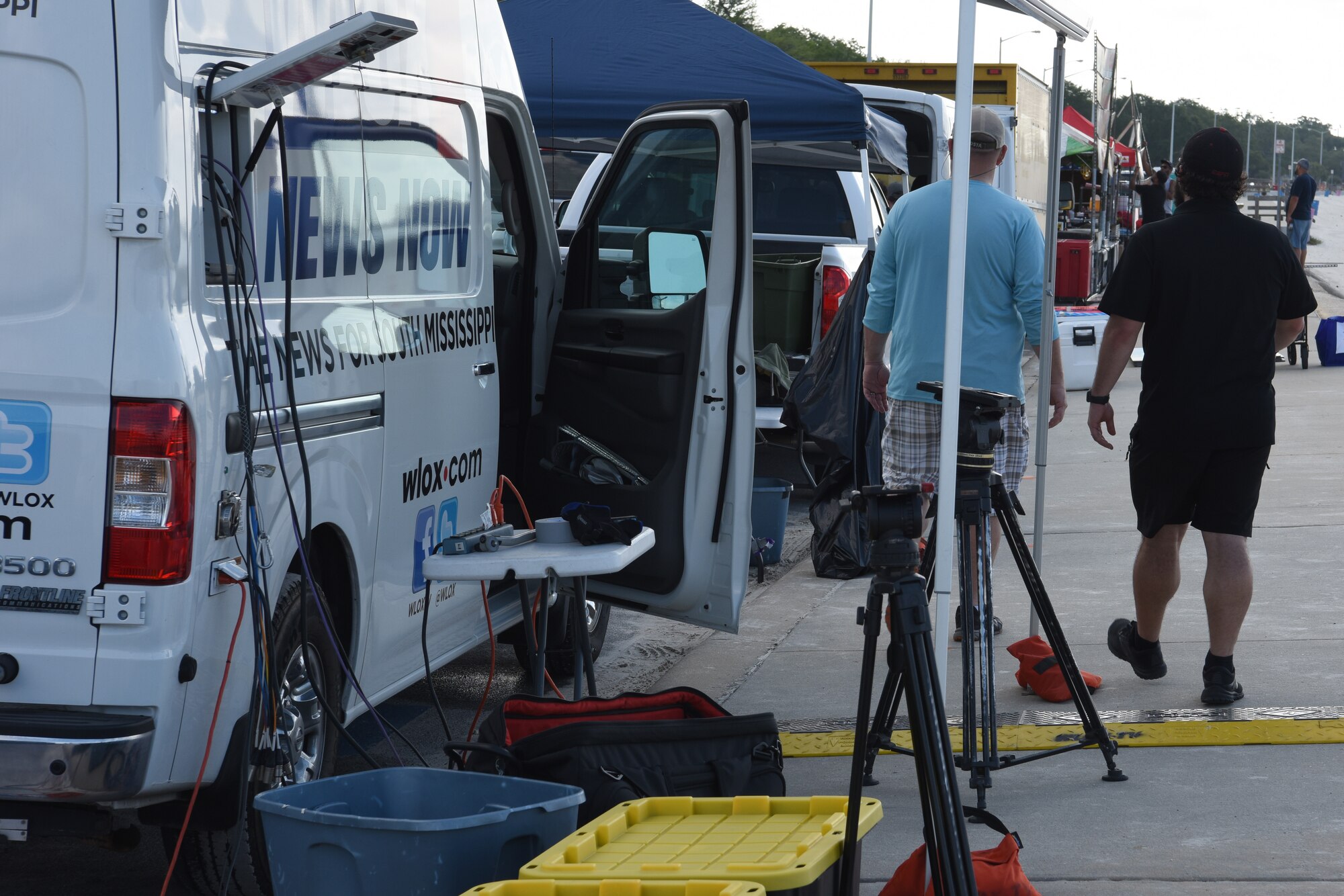 Local news stations and food vendors set up for the Keesler and Biloxi Air and Space Show in Biloxi, Mississippi, May 3, 2019. Thunder Over the Sound is a unique, one-of-a-kind event where a base and its surrounding city jointly host one air show geographically separated. (U.S. Air Force photo by Senior Airman Jenay Randolph)