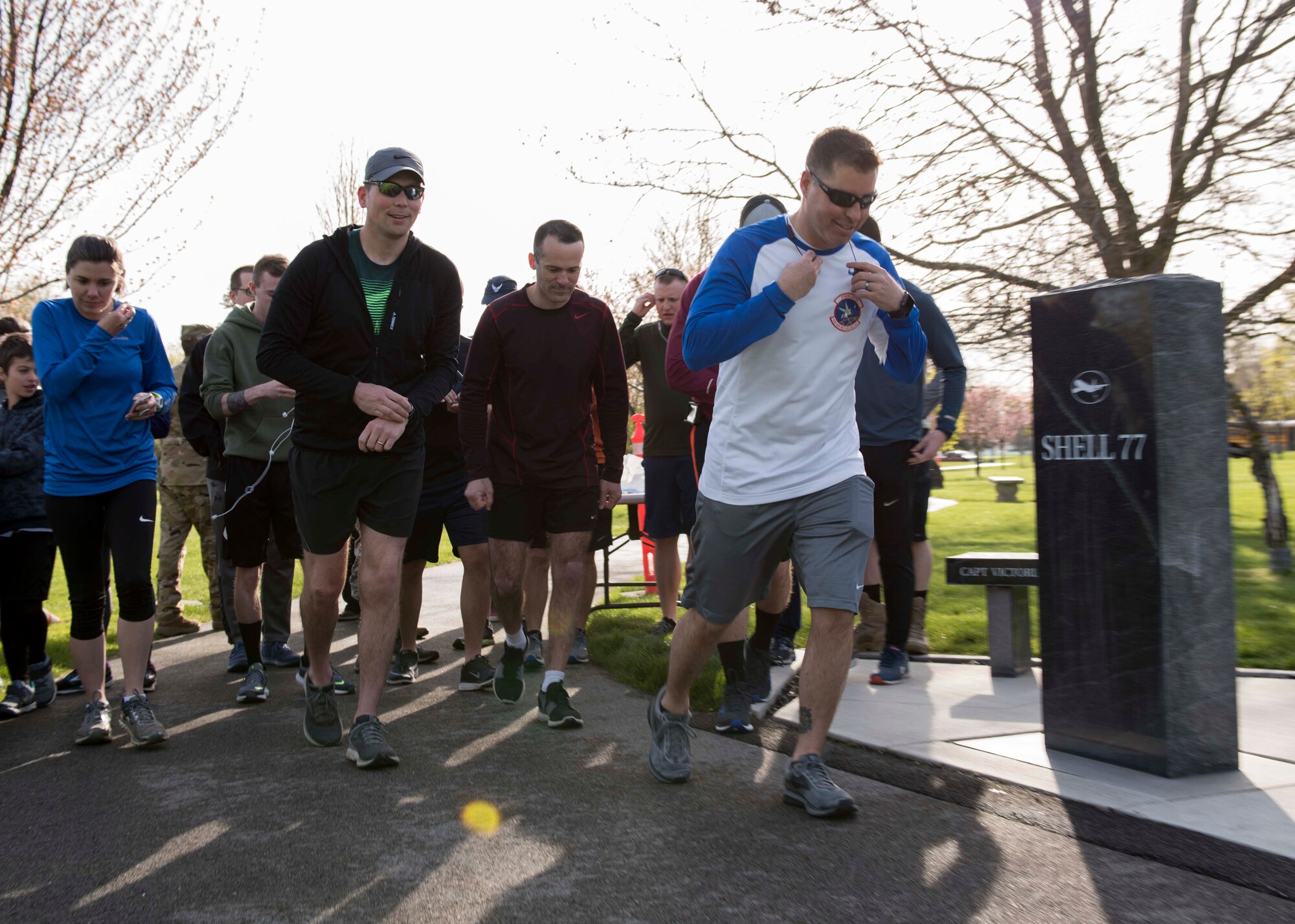 Team Fairchild Airmen and family members take-off from the starting line for the commemorative Shell 77 5K Run at Fairchild Air Force Base, Washington, May 3, 2019. Shell 77 was a tragic incident where three Airmen perished when their KC-135 Stratotanker crashed in northern Kyrgyzstan on May 3, 2013, while flying in support of Operation Enduring Freedom. (U.S. Air Force photo by Senior Airman Ryan Lackey)