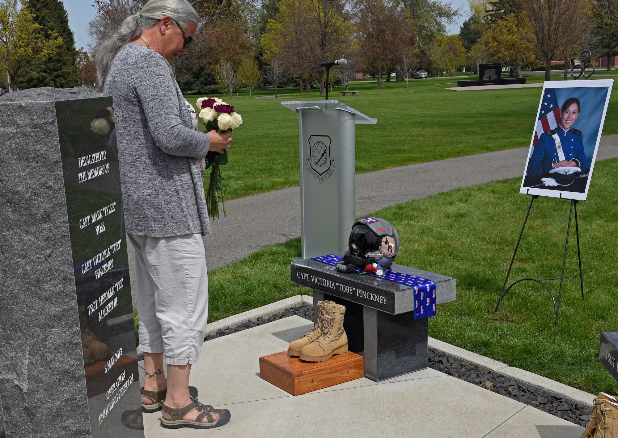 Michelle Carter, mother of U.S. Air Force Capt. Victoria “Tory” Pickney, lays flowers on her daughter’s memorial site during a Shell 77 memorial ceremony at Fairchild Air Force Base, Washington, May 3, 2019. Pickney and two other Fairchild Airmen, Capt. Mark “Tyler” Voss and Tech. Sgt. Herman “Tre” Mackey III sacrificed their lives during Operation Enduring Freedom. The KC-135 Stratotanker, tail number 63-8877, crashed over Kyrgyzstan on May 3, 2013. (U.S. Air Force photo by Senior Airman Jesenia Landaverde)