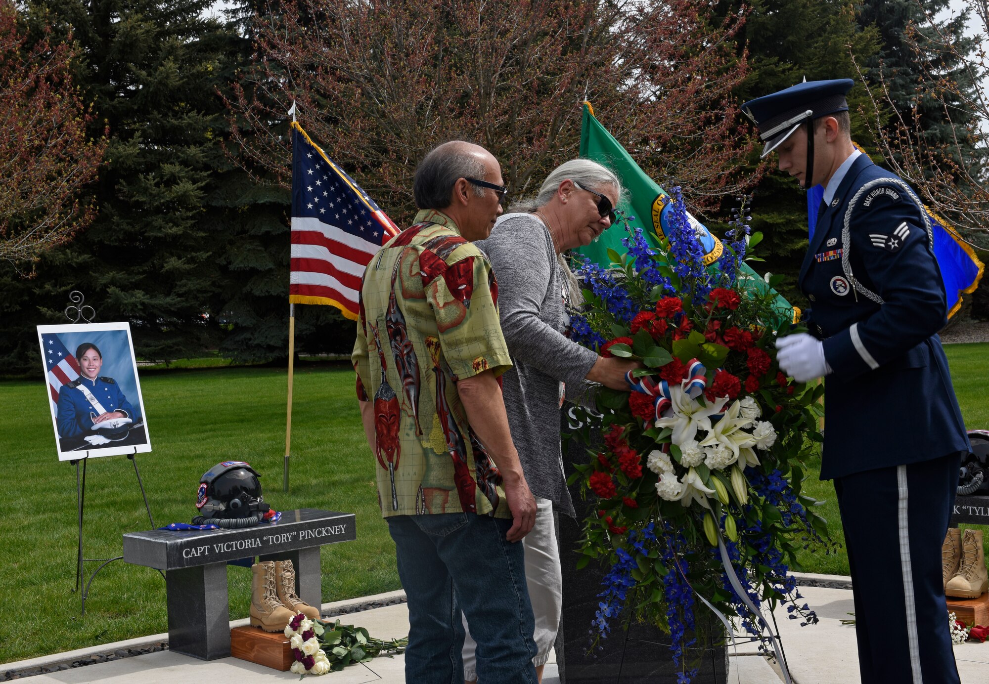 Larry and Michelle Castro, parents of U.S. Air Force Capt. Victoria “Tory” Pickney, and Senior Airman Samuel Roberts, 92nd Air Refueling Wing Honor Guardsman, lay a wreath during a Shell 77 memorial ceremony at Fairchild Air Force Base, Washington, May 3, 2019. Fairchild pays tribute every year to the Shell 77 aircrew, Capt. Mark “Tyler” Voss, Capt. Victoria “Tory” Pickney and Tech. Sgt. Herman “Tre” Mackey III. These Fairchild Airmen sacrificed their lives in support of Operation Enduring Freedom in May 3, 2013. (U.S. Air Force photo by Senior Airman Jesenia Landaverde)