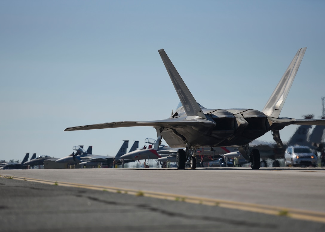 An F-22 Raptor taxis on the runway during Checkered Flag 19-1 at Tyndall Air Force Base, Florida, May 6, 2019.