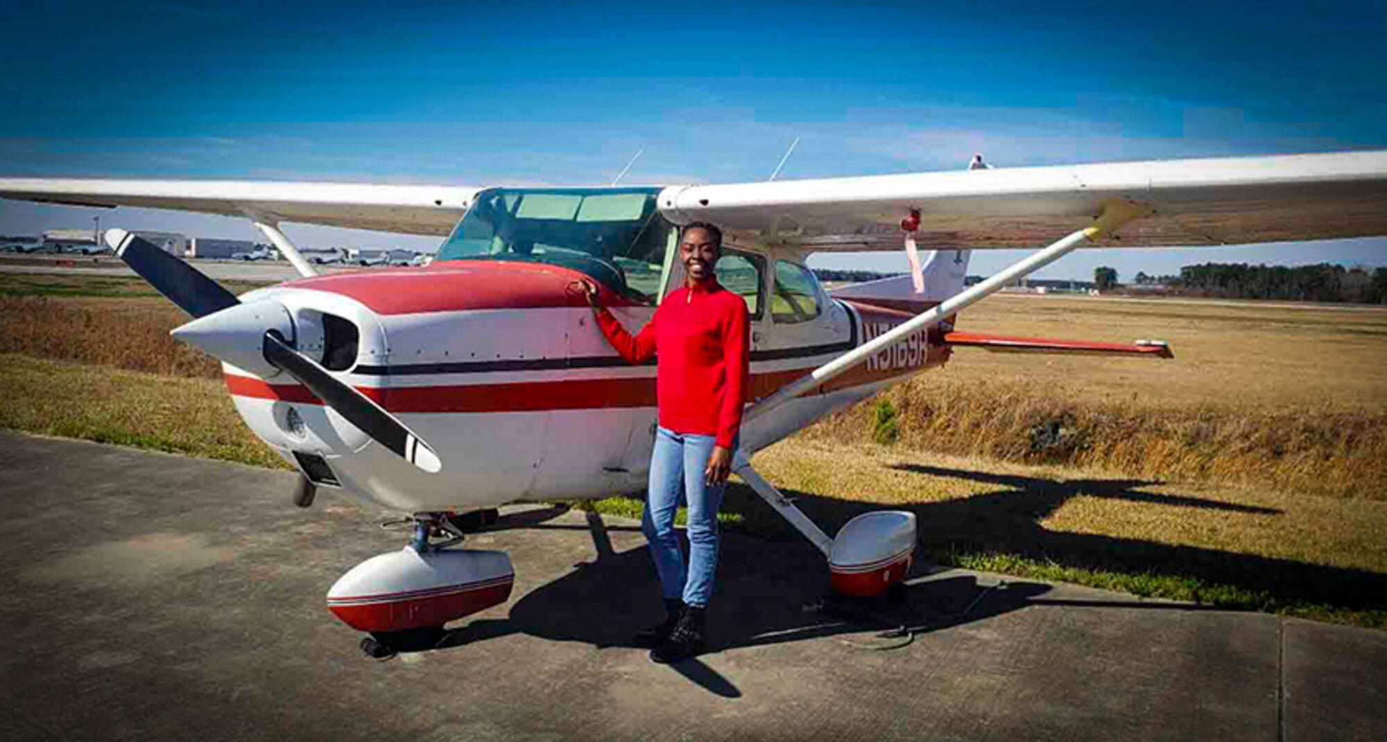 Staff Sgt. Shakeyna Smith, aviation resource management technician with the 701st Airlift Squadron at Joint Base Charleston, stands next to a Cessna 172 before taking flight, Jan. 25, 2019, in North Charleston, South Carolina. Smith completed 72 hours of flight time through Charleston Regional Accelerated Flight Training and IFR6 of N. Charleston, S.C., before persuing a commision in the U.S. Air Force to pilot C-17 Globemaster III's while being a single parent of two, a full-time college student and an Air Force Reservist. (Courtesy photo/Staff Sgt. Shakeyna Smith)