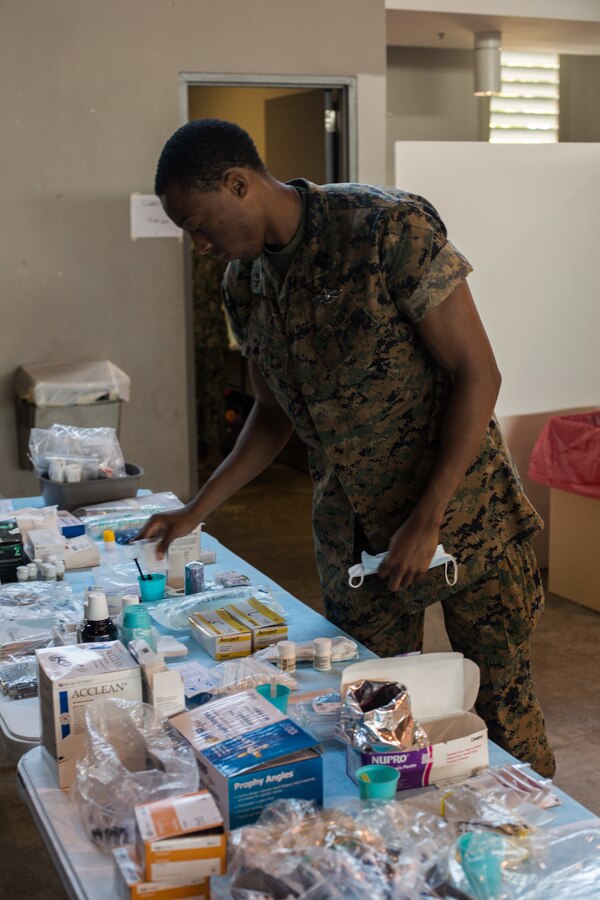 U.S. Navy Petty Officer 2nd Class Ryan Pyne, a hospital corpsman with 4th Dental Battalion, 4th Marine Logistics Group, Marine Forces Reserve, organizes dental supplies at Ponce, Puerto Rico, May 3, 2019, during Innovative Readiness Training Puerto Rico. IRT Puerto Rico is also called Ola de Esperanza Sanadora, which translates to Healing Wave of Hope. MARFORRES Sailors are working jointly with several National Guard and Reserve units from across the nation to provide medical care in Puerto Rico during a two-week medical exercise. (U.S. Marine Corps photo by Lance Cpl. Faeth Webb)