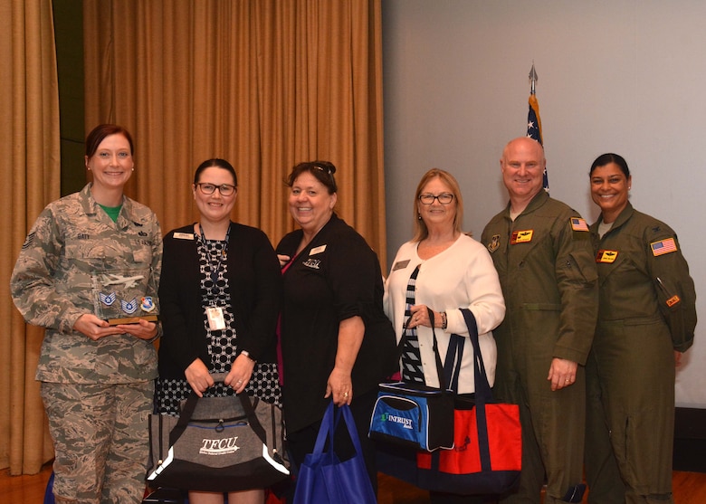 Tech. Sgt. Amanda Baty, 507th Force Support Squadron, stands with the 507th Air Refueling Wing's leadership and community partners after accepting the Noncommissioned Officer of the Quarter award for the first quarter during the May UTA commander's call May 5, 2019, Tinker Air Force Base, Oklahoma. (U.S. Air Force photo by Senior Airman Mary Begy)