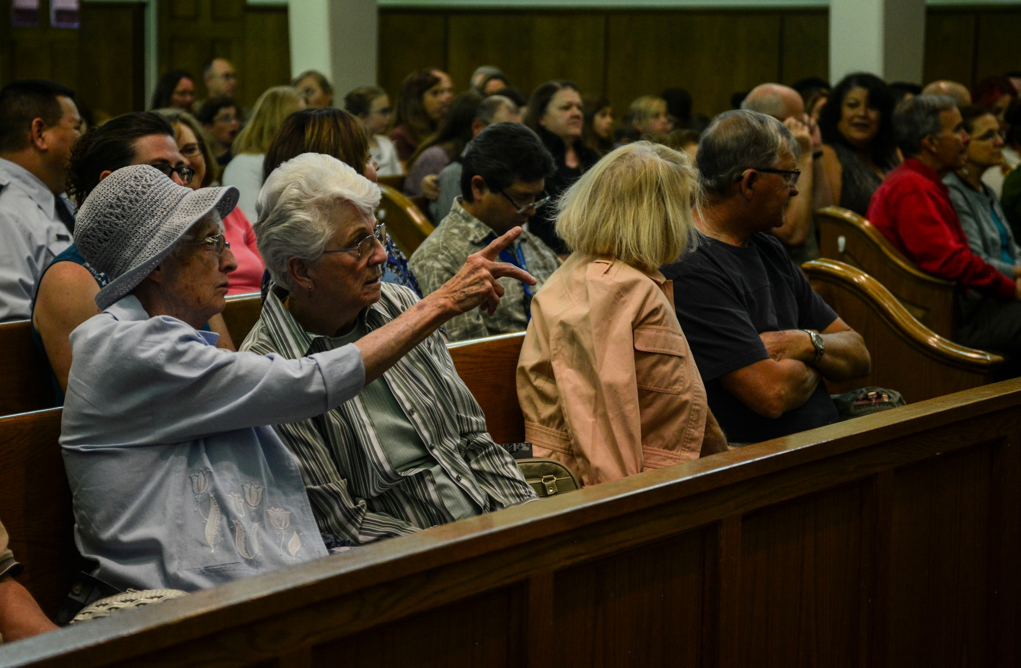 Two audience members admire the set of the play “Corrie Remembers,” the true story of a woman who saved nearly 800 Jewish people during the Holocaust, at Kirtland Air Force Base, N.M., May 3, 2019. The Kirtland AFB Chaplain Corps hosts an annual Days of Remembrance event to honor the lives lost and those who survived.