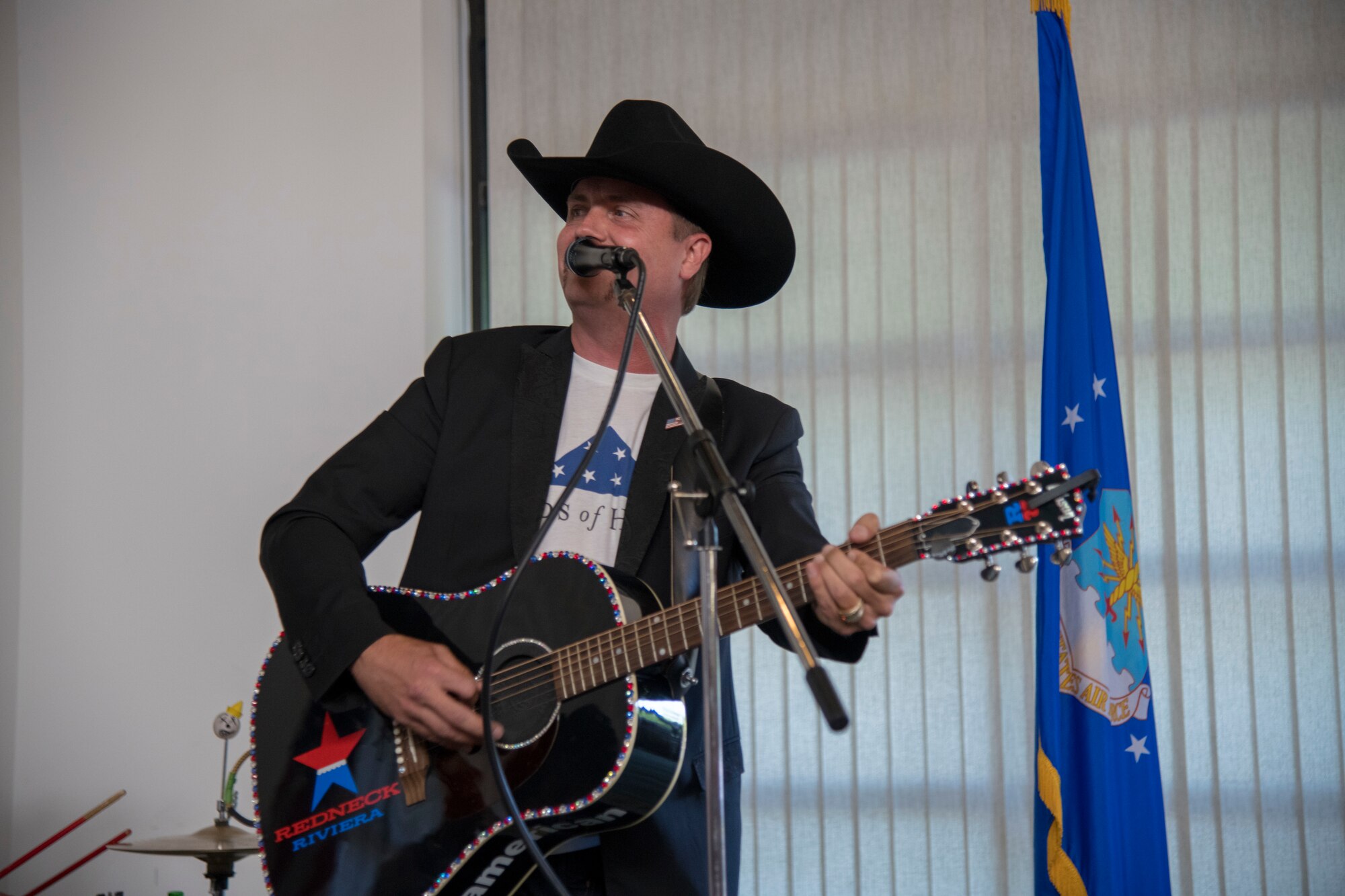 John Rich, American singer-songwriter of "Big & Rich", performes for servicemembers and their families  May 3, 2019, at The Landings on Dover Air Force Base, Del. The concert was held in conjunction with the Dover AFB's monthly First Friday social and included stock cars from professional NASCAR drivers.
