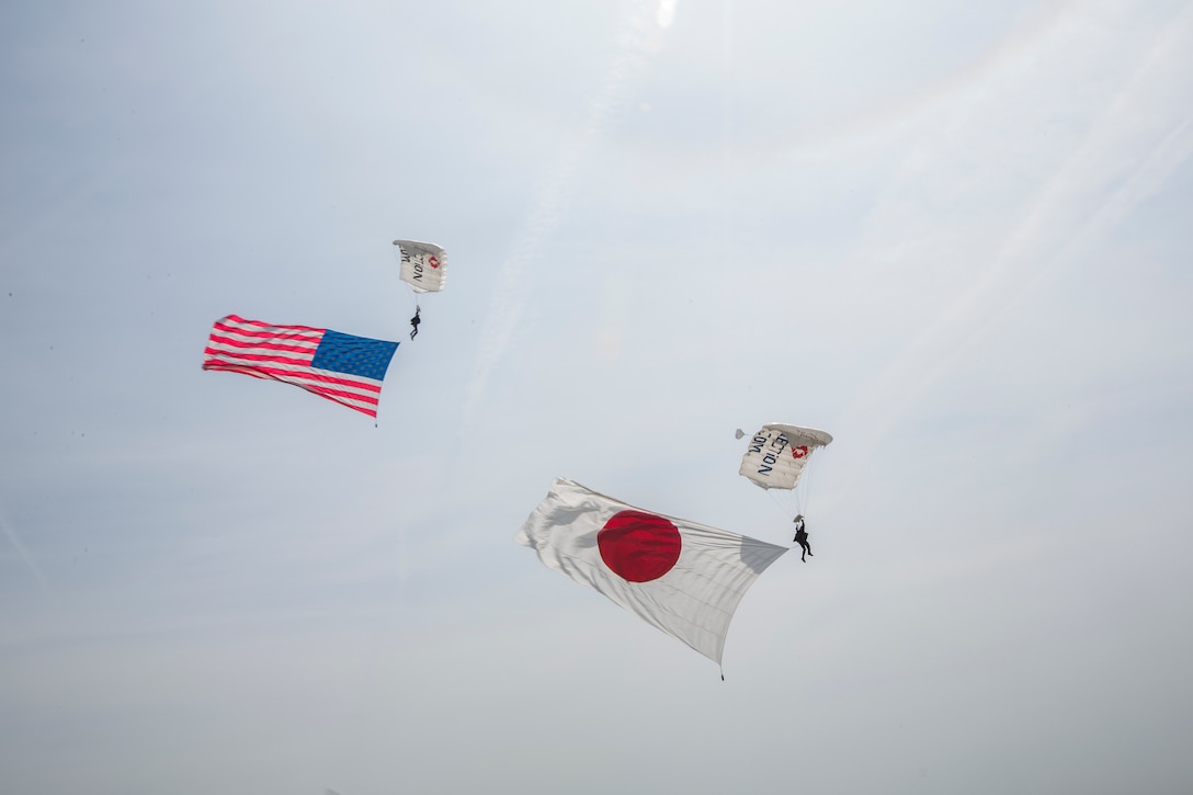 Team Fastrax perform a flag jump during the 43rd Japan Maritime Self-Defense Force – Marine Corps Air Station Iwakuni Friendship Day at MCAS Iwakuni, Japan, May 5, 2019. Since 1973, MCAS Iwakuni has held a single-day air show designed to foster positive relationships and offer an exciting experience that displays the communal support between the U.S. and Japan. The air show encompassed various U.S. and Japanese static display aircraft, aerial performances, food and entertainment.