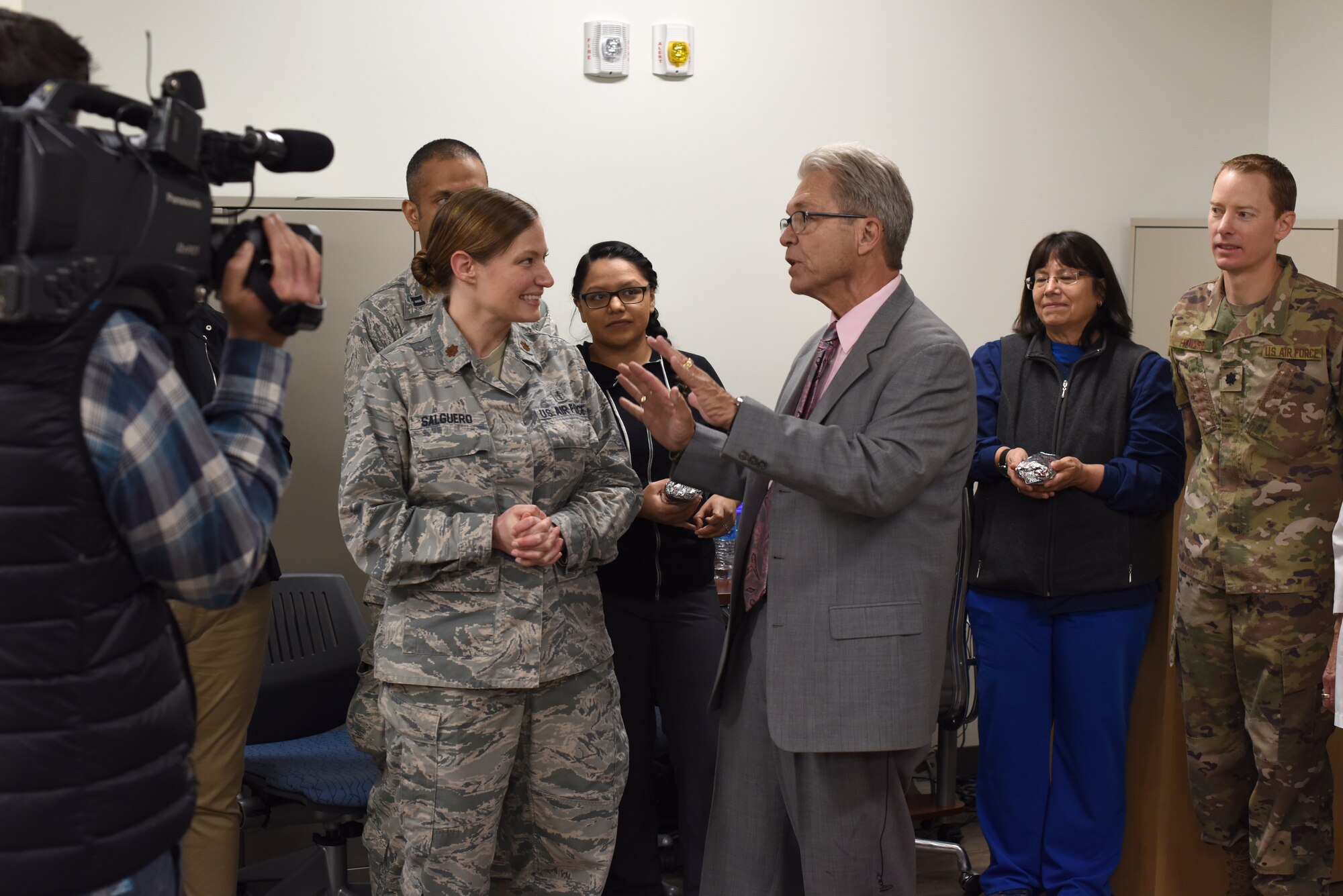 U.S. Air Force Maj. Jennifer Salguero, Family Health Clinic Medical Director, speaks with Steve Stucker, host of the Morning Shift Salute, at the 377th Medical Group April 30, 2019. The Family Health Clinic was recently awarded the 2018 Air Force Global Strike Command Outstanding Medical Home Award, as well the 377th Air Base Wing Team of the Year award. (U.S. Air Force photo by Senior Airman Eli Chevalier)