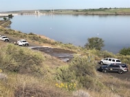 Shoreline Drive between Ice Harbor Lock and Dam, and Charbonneau Park in Walla Walla County is temporarily closed because of a washout. Corps staff are coordinating with the Walla Walla County Sheriff’s Office to locate the source of the pressurized water which was undercut the nearby railroad tracks and flooded Shoreline Drive with mud and rocks.