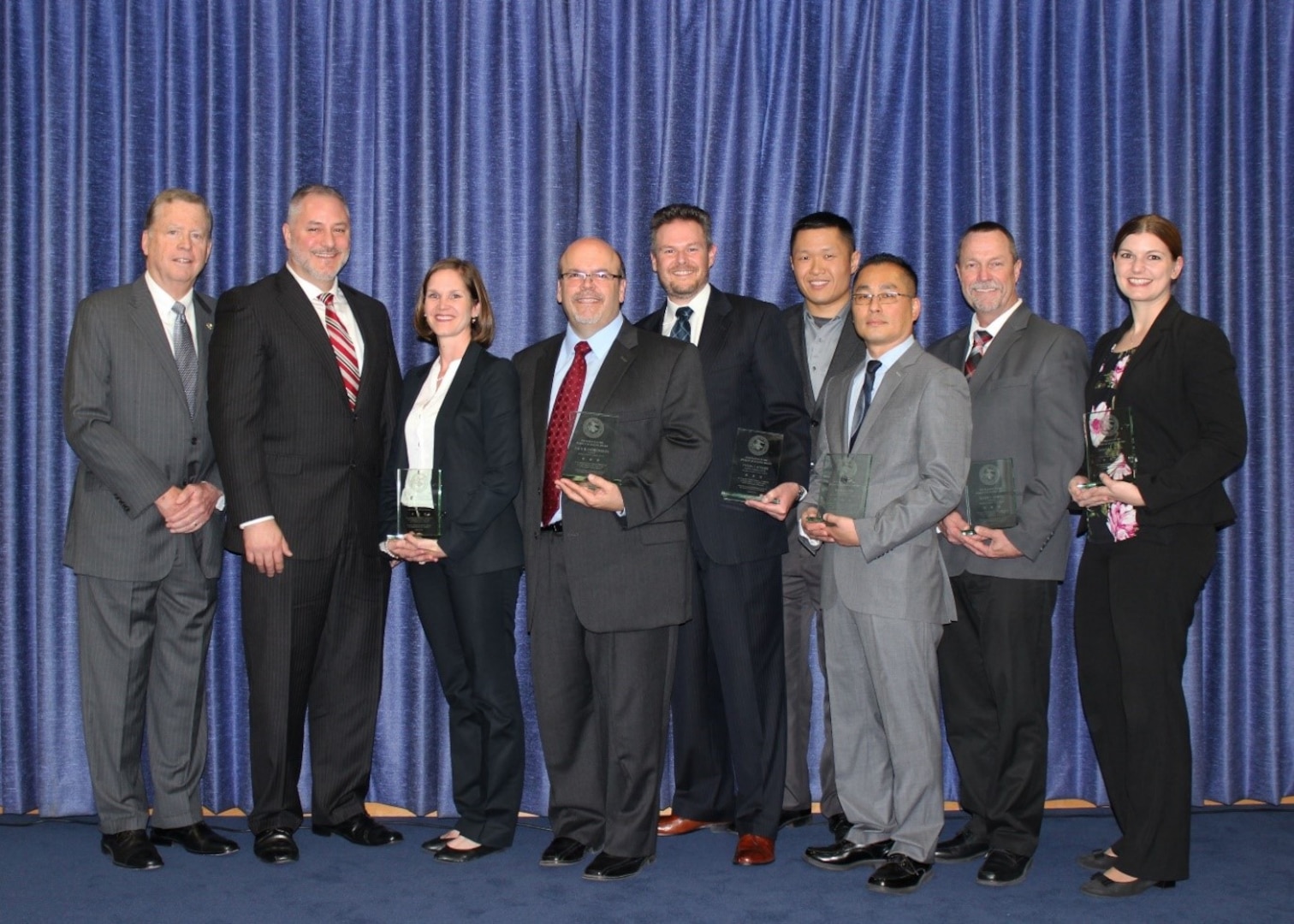 award winners pose after the award ceremony