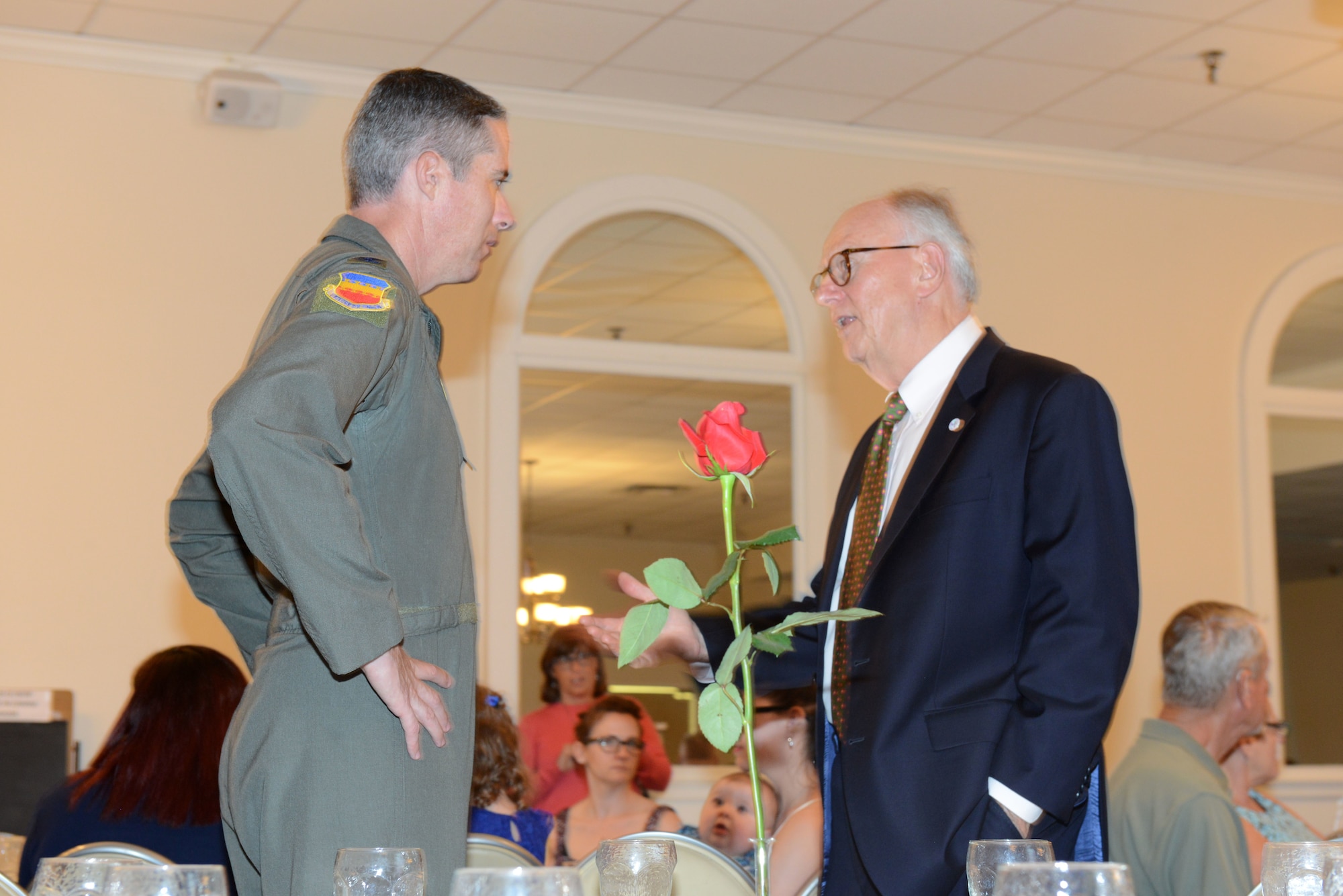 Col. Derek O’Malley, 20th Fighter Wing commander, left, speaks with Joe McElveen, Sumter’s mayor as they meet at a military dependent scholarship giveaway, at Shaw Air Force Base, S.C., May 2, 2019.