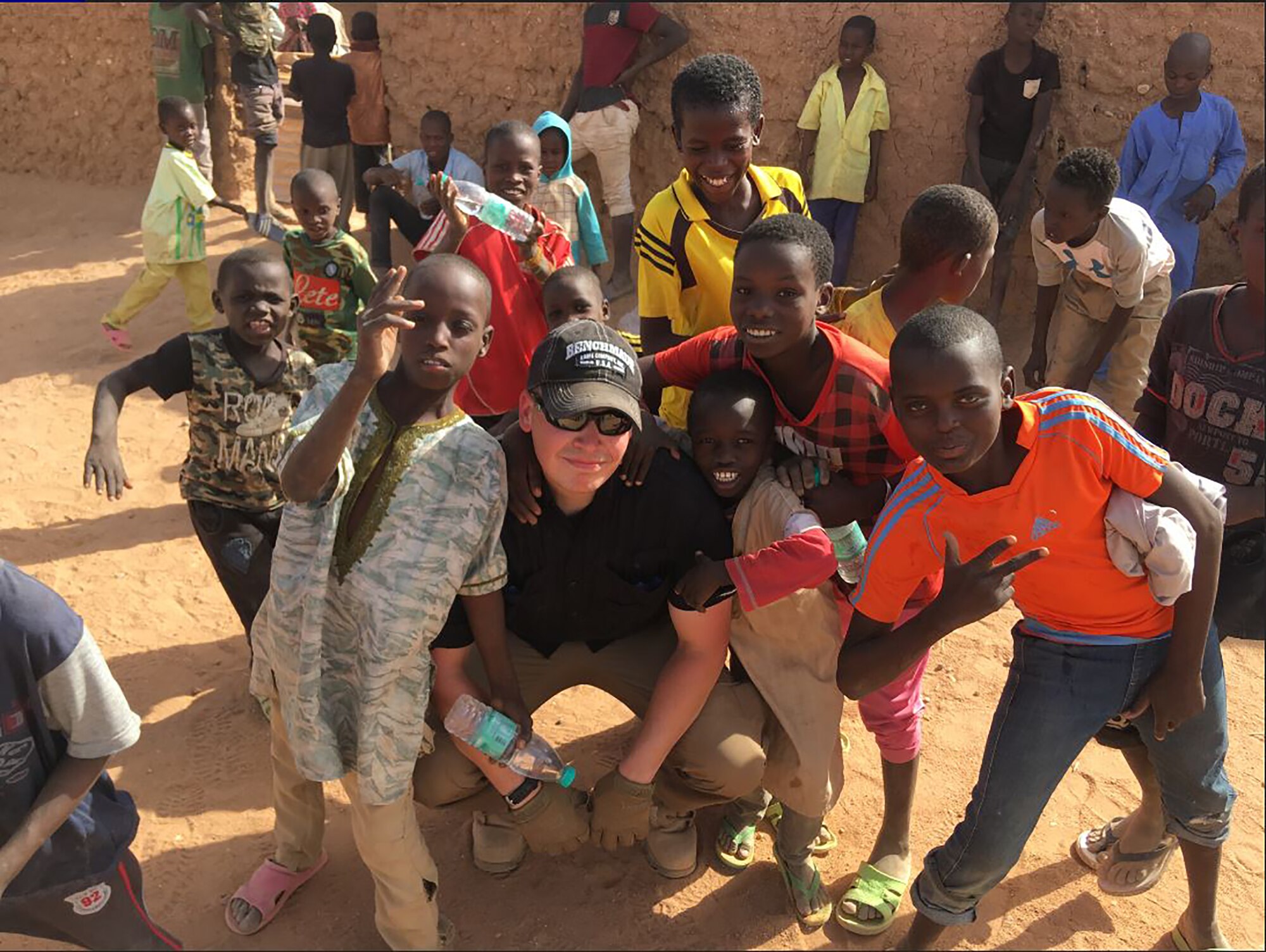 Capt. Ian McNeil, 718th Intelligence Squadron assistant director of operations, was deployed to the African continent where he engaged in a variety of missions, including working to improve the lives of the local population. He helped to build additional classrooms for an overpopulated school and coordinated with the 718th IS to conduct a supplies drive to support the school. (Courtesy photo)