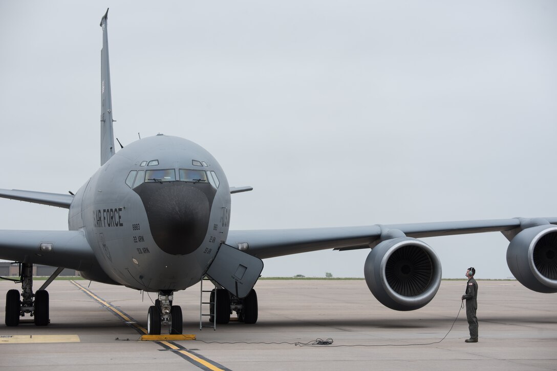 McConnell Airmen start a KC-135 Stratotanker during an alert demonstration May 1, 2019, at McConnell Air Force Base, Kan. During an alert, aircrew must quickly react to provide aerial refueling to ensure that the receiver’s mission is able to continue. (U.S. Air Force photo by Senior Airman Alan Ricker)