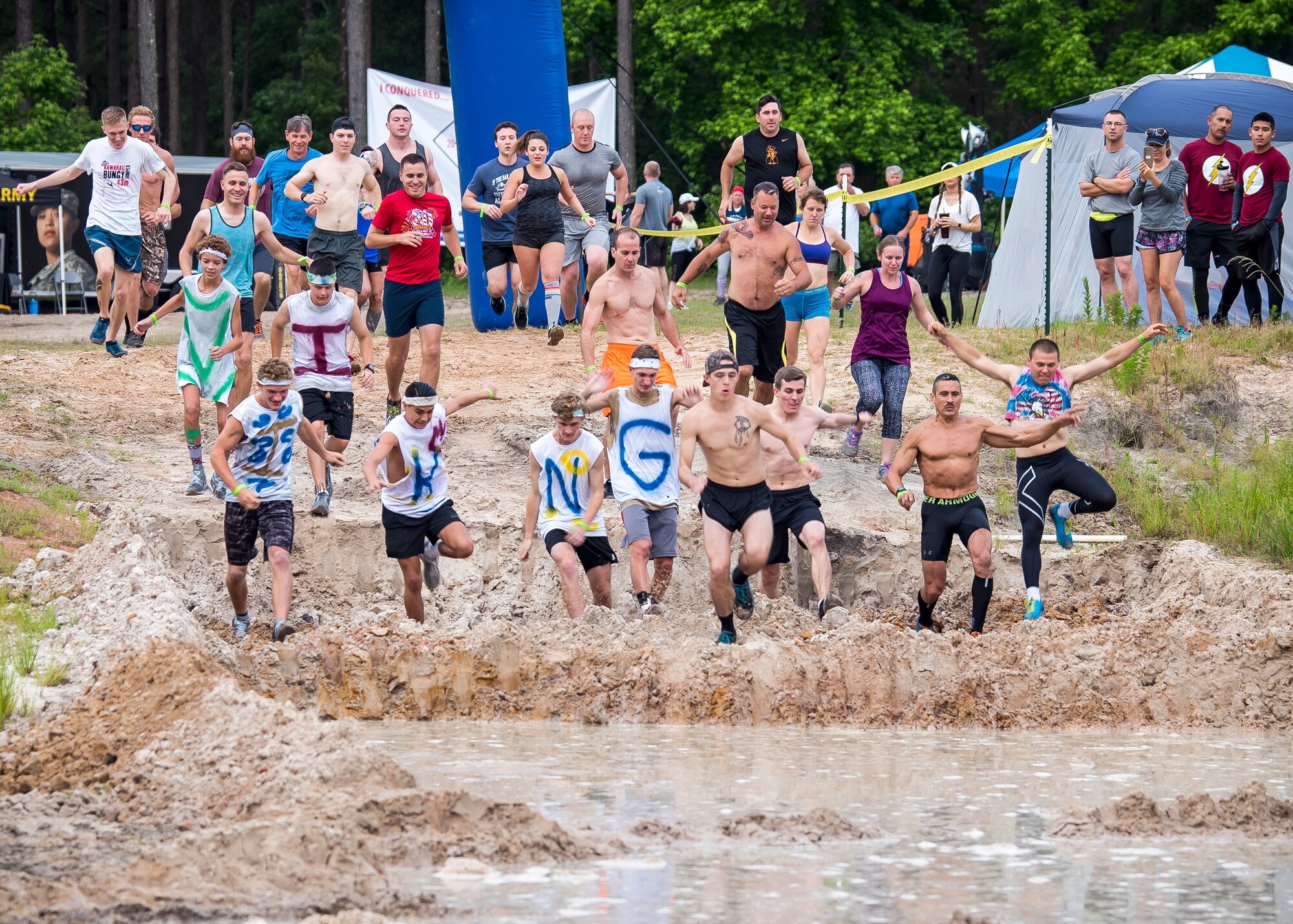 Moody Mud run participants start the race, May 4, 2019, in Ray City, Ga. The sixth annual Mud Run had approximately 850 participants who had to overcome a series of obstacles on the 4 and 5-mile courses. The 32-obstacle course gave Airmen, families and the local community an opportunity to build camaraderie and teamwork skills. (U.S. Air Force photo by Airman 1st Class Eugene Oliver)