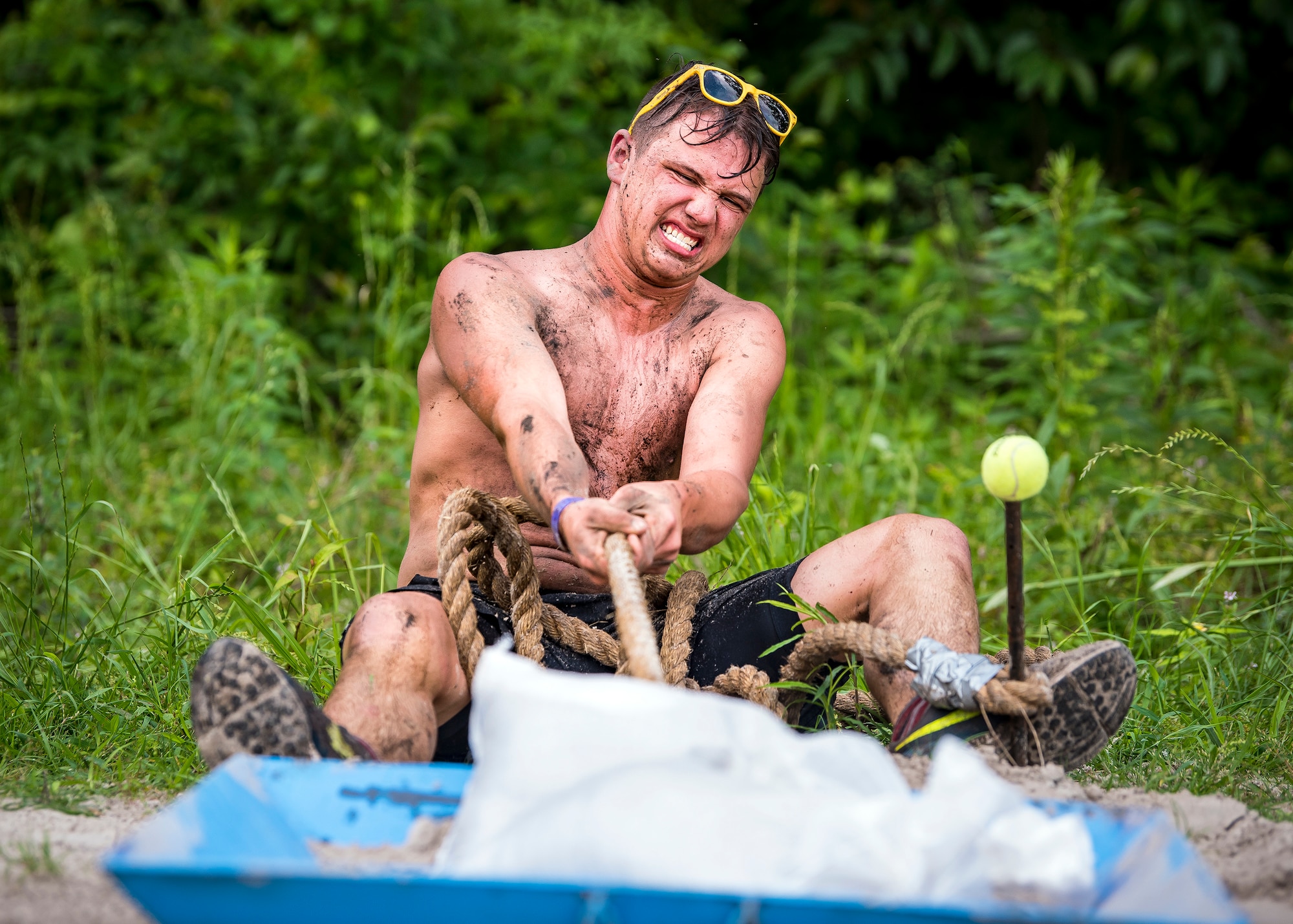 A Moody Mud Run participant pulls a weighted sled, May 4, 2019, in Ray City, Ga.The sixth annual Mud Run had approximately 850 participants who had to overcome a series of obstacles on the 4 and 5-mile courses. The 32-obstacle course gave Airmen, families and the local community an opportunity to build camaraderie and teamwork skills. (U.S. Air Force photo by Airman 1st Class Eugene Oliver)