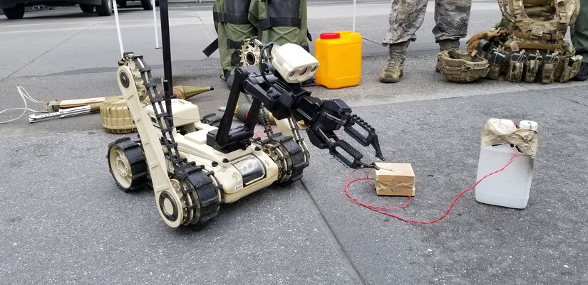 Airmen assigned to the 514th Explosive Ordnance Disposal demonstrates how they utilize a robot to defuse a bomb at the Intrepid Sea, Air & Space Museum during the Air Force Convention in New York City, May 4, 2019.