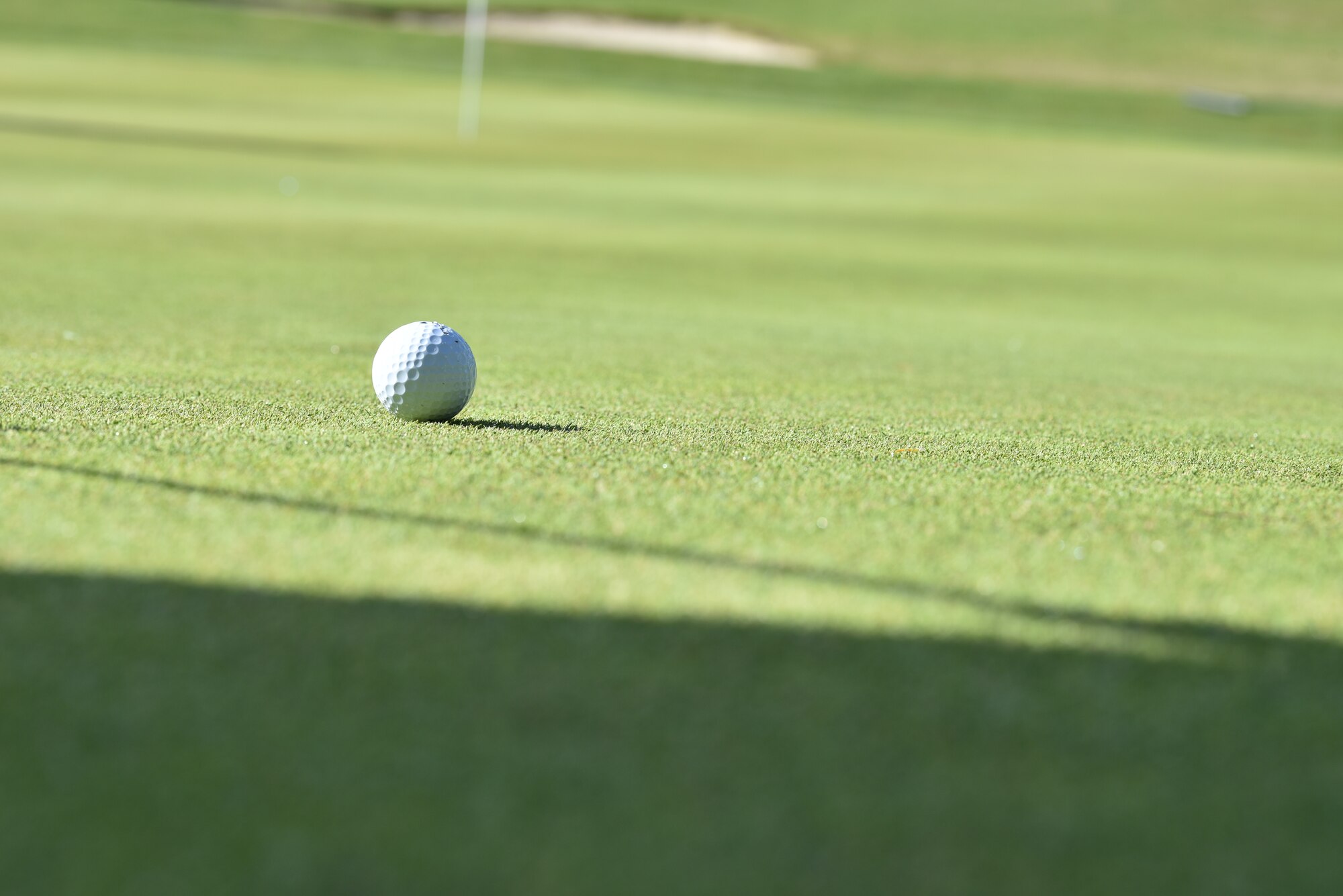 A golf ball is left on a golf course at the Spokane Lilac Festival Armed Forces Appreciation Golf Tournament, at Qualchan Golf Course in Spokane, Washington, May 3, 2019.
