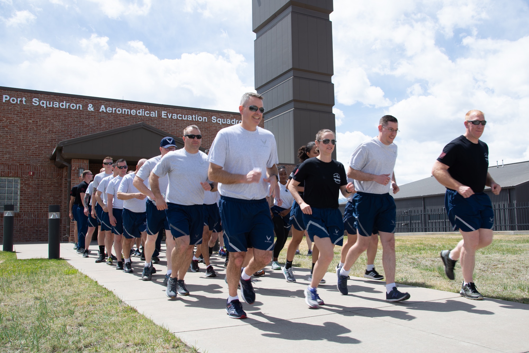 Airmen with the 39th Aerial Port Squadron start the 5th Annual Port Dawg Memorial Run May 4, 2019 at Peterson Air Force Base, Colorado.